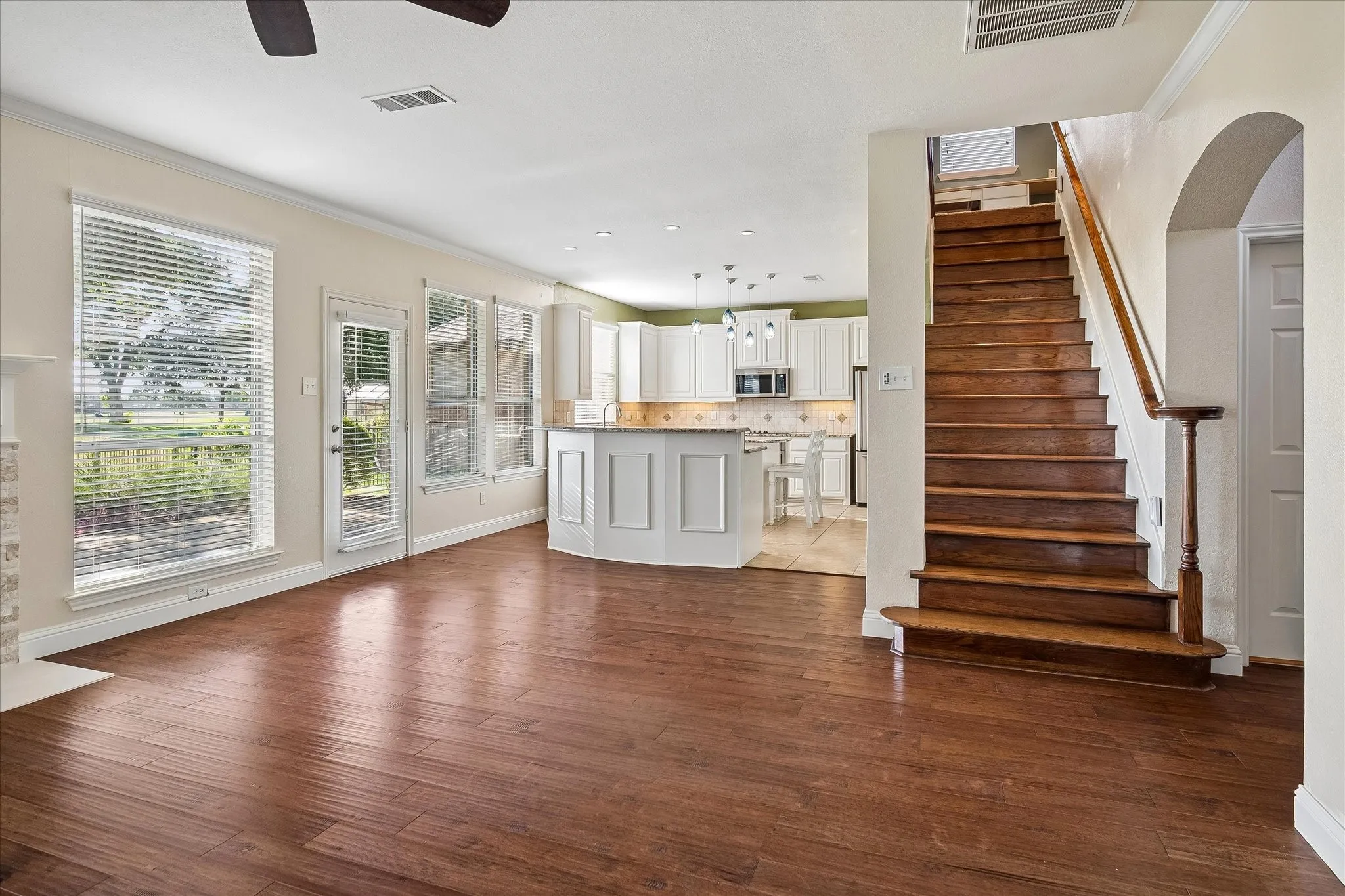 Wall of windows in the Family Room & Kitchen give you golf course views and allow natural light to flood the space!