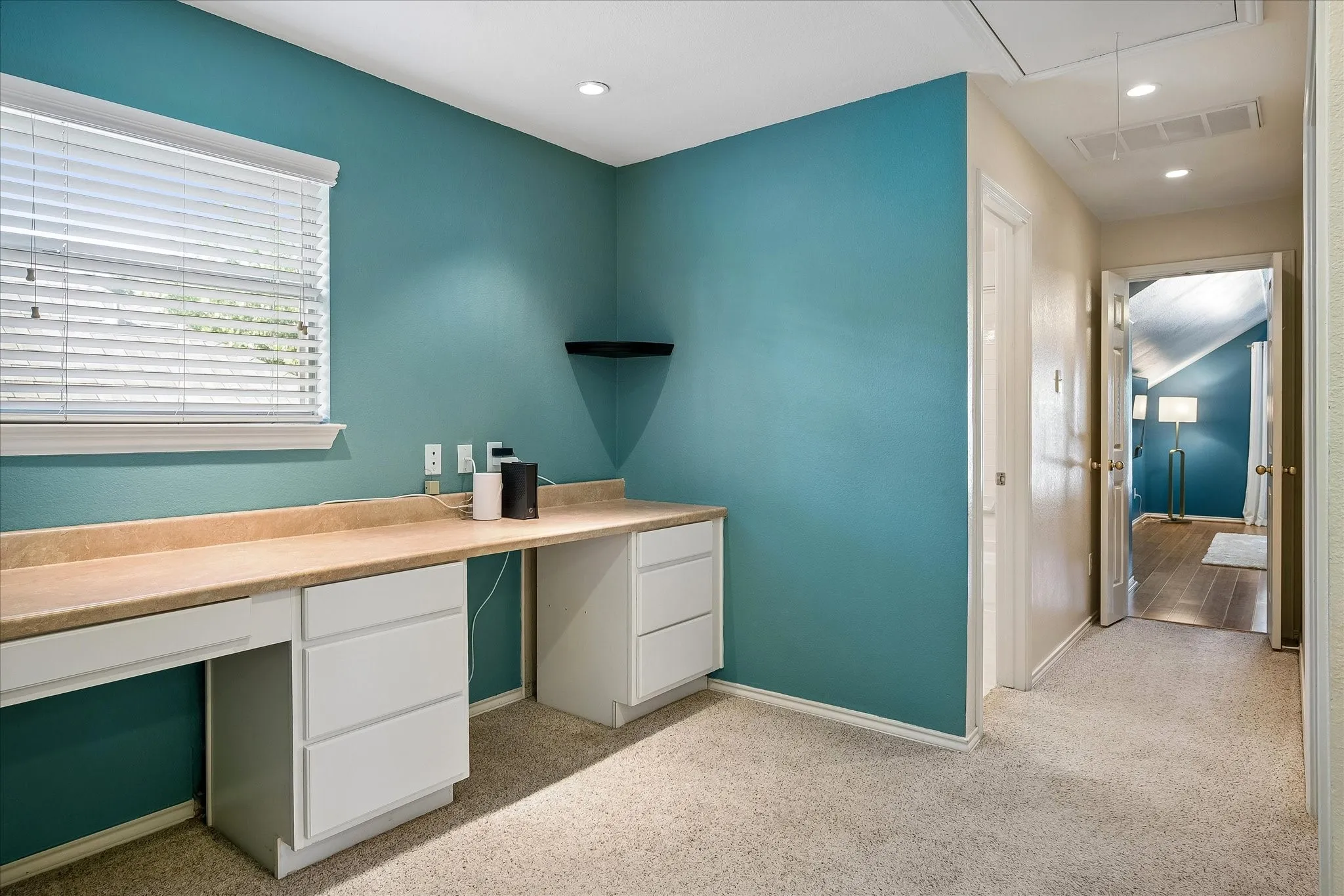 At the top of the stairs you will find a dedicated office space, with a built-in desk, and two knee spaces for you or the kids.