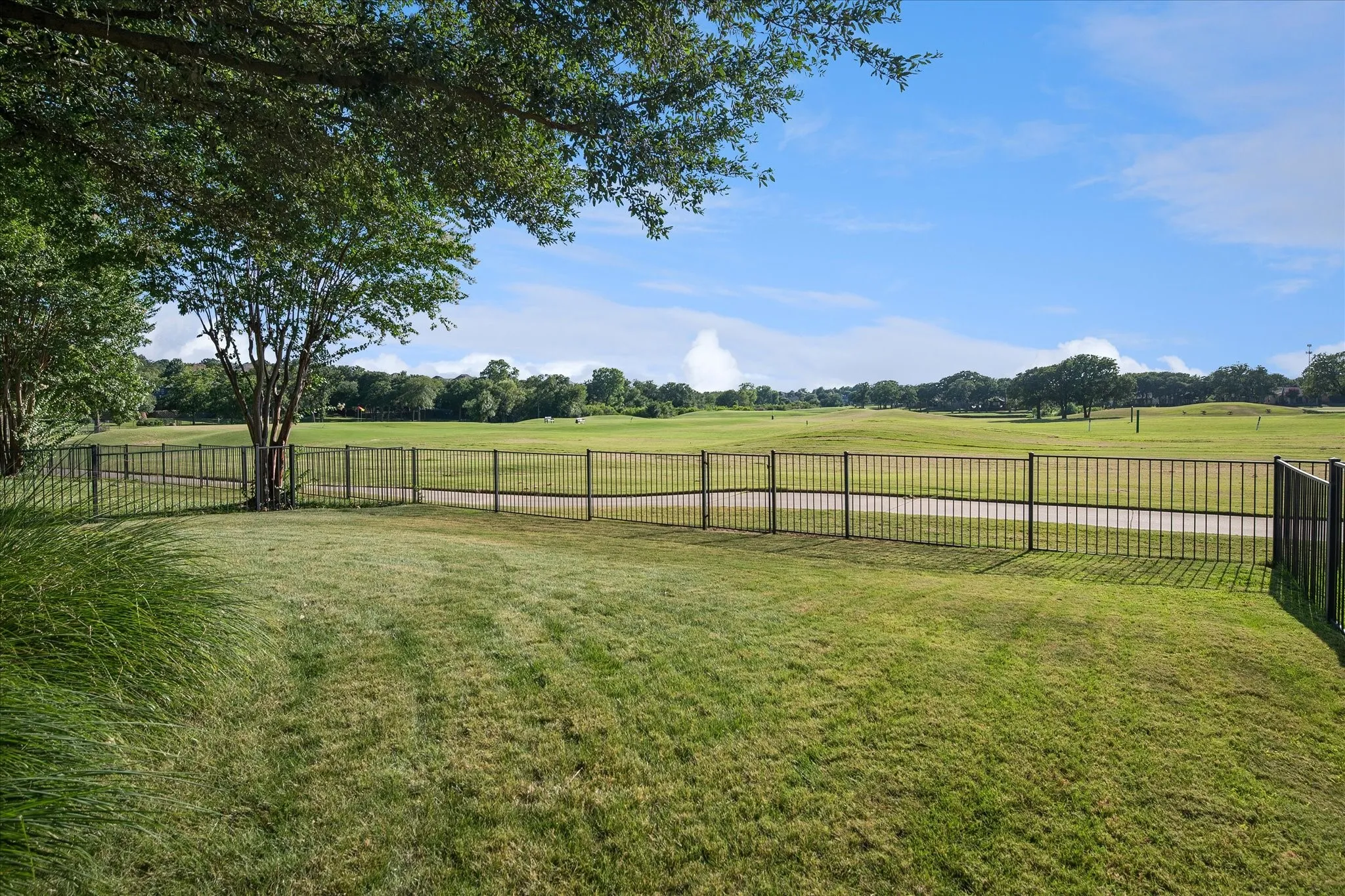 or wake up to sweeping golf course views in this exceptional Fairway Vista home