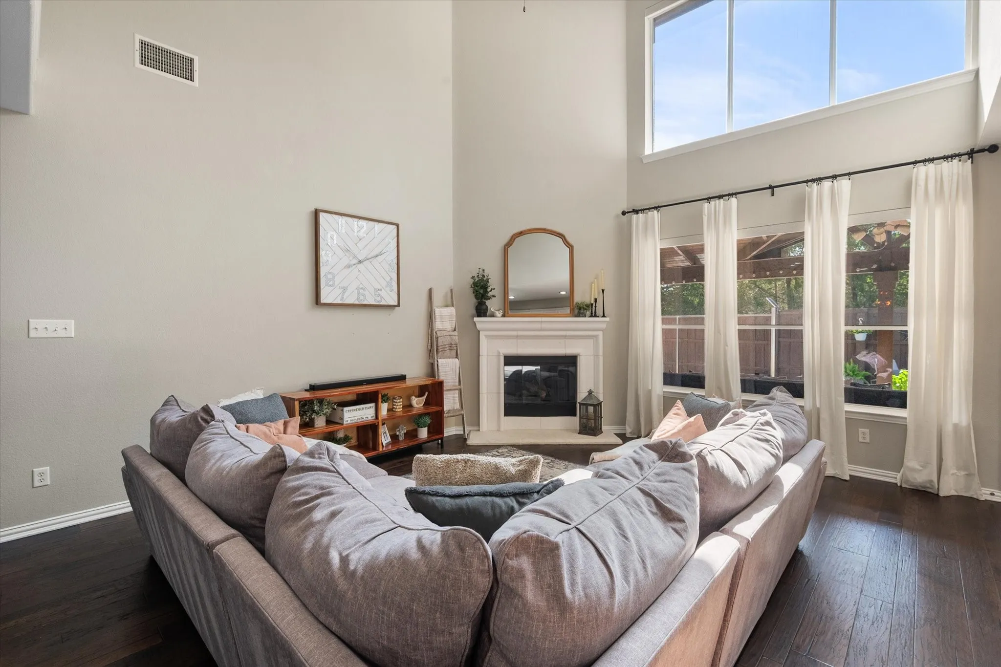 Towering windows allow for natural light in the main living areas!