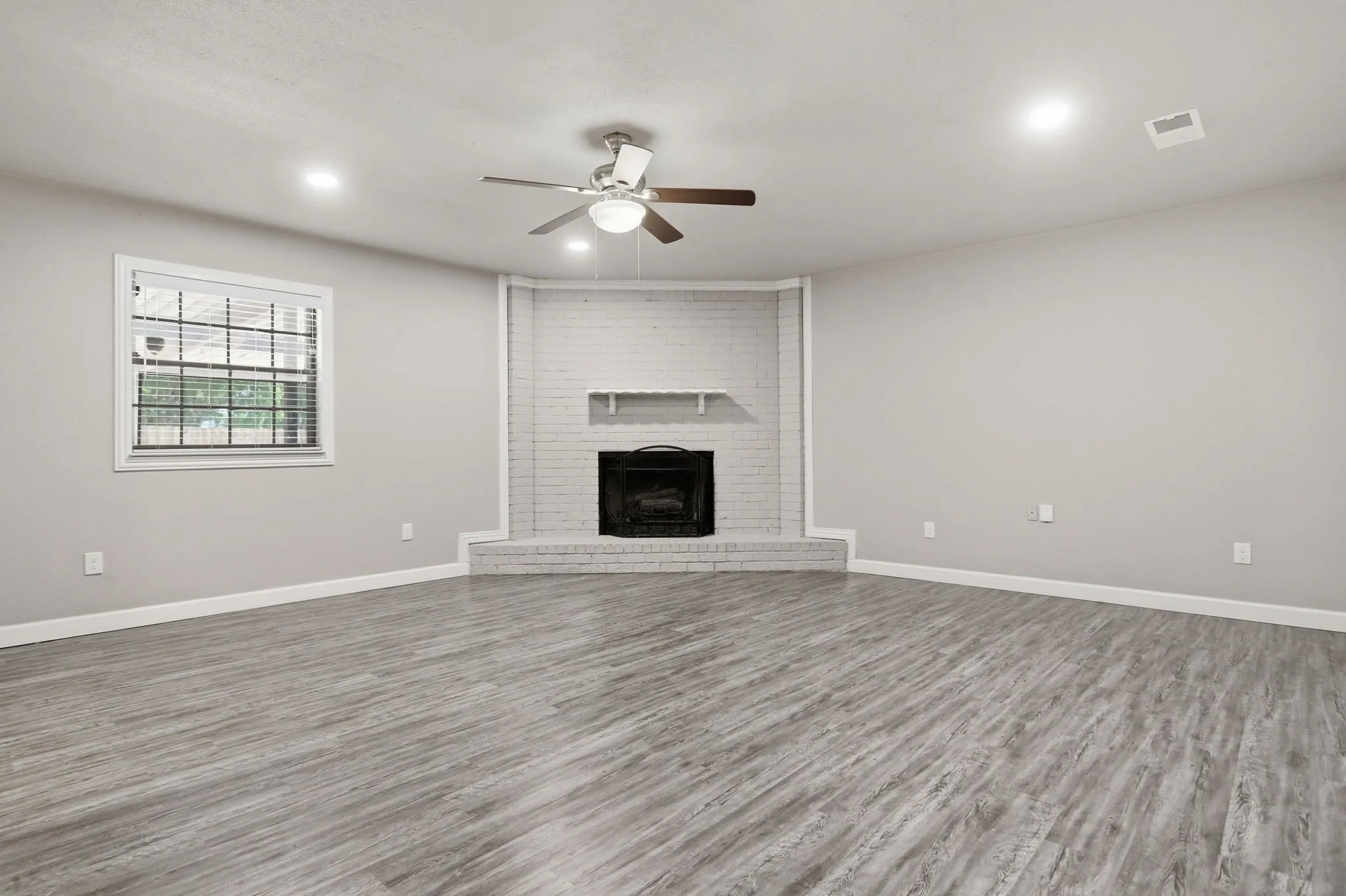floor to ceiling brick fireplace