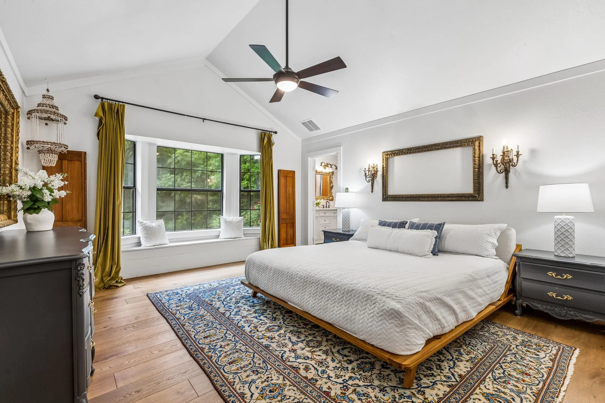 Primary bedroom with beautiful and private views of the backyard