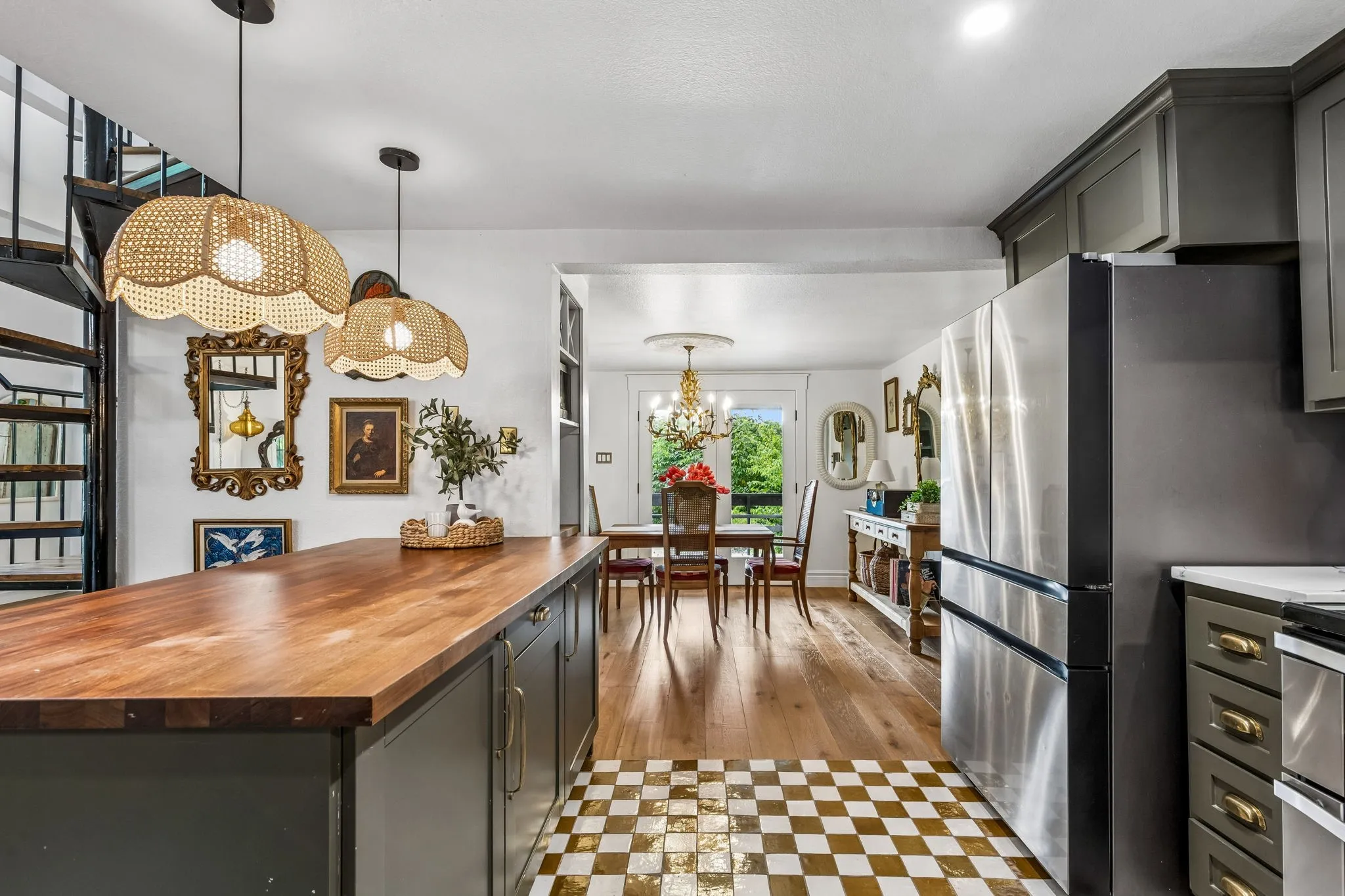 View from the kitchen into the dining room and never-ending views of the property beyond.