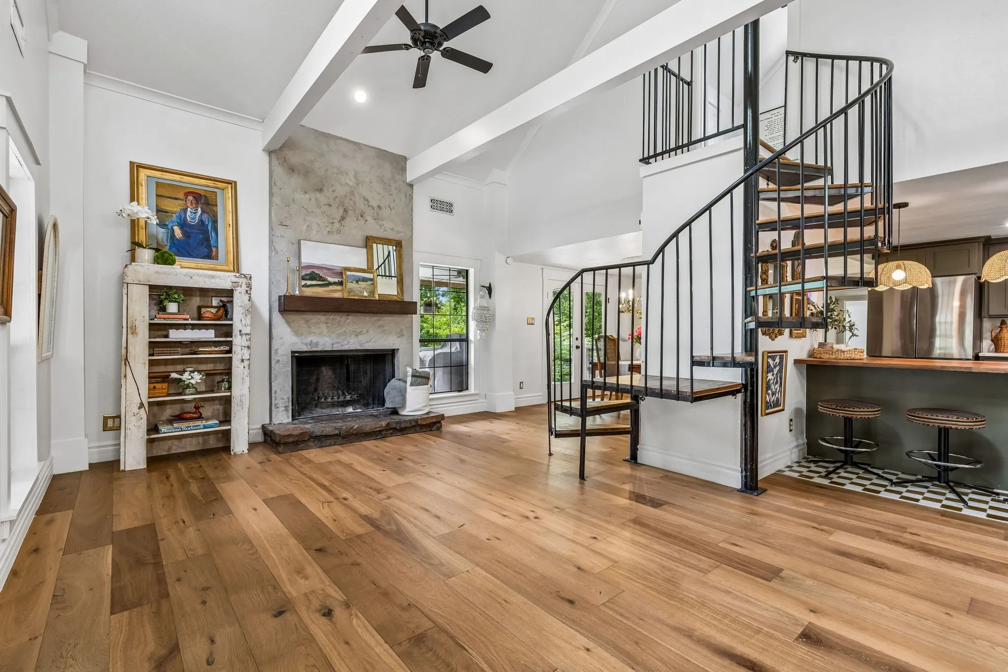 Cozy and inviting floor-to-ceiling wood burning fireplace that is magical on a cold evening.