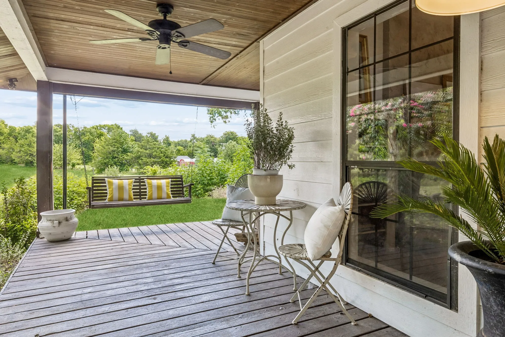 Take in the peaceful and private surroundings from your beautiful wraparound porch.