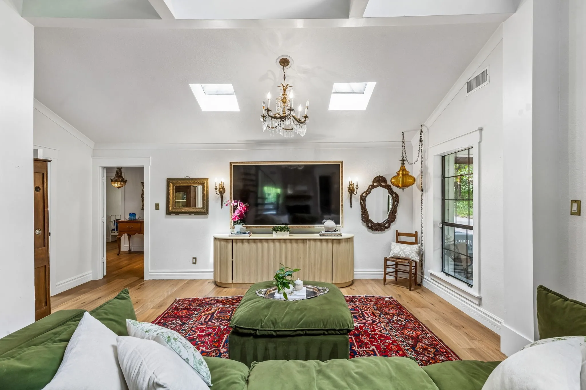 Living room with the guest bath to the side.