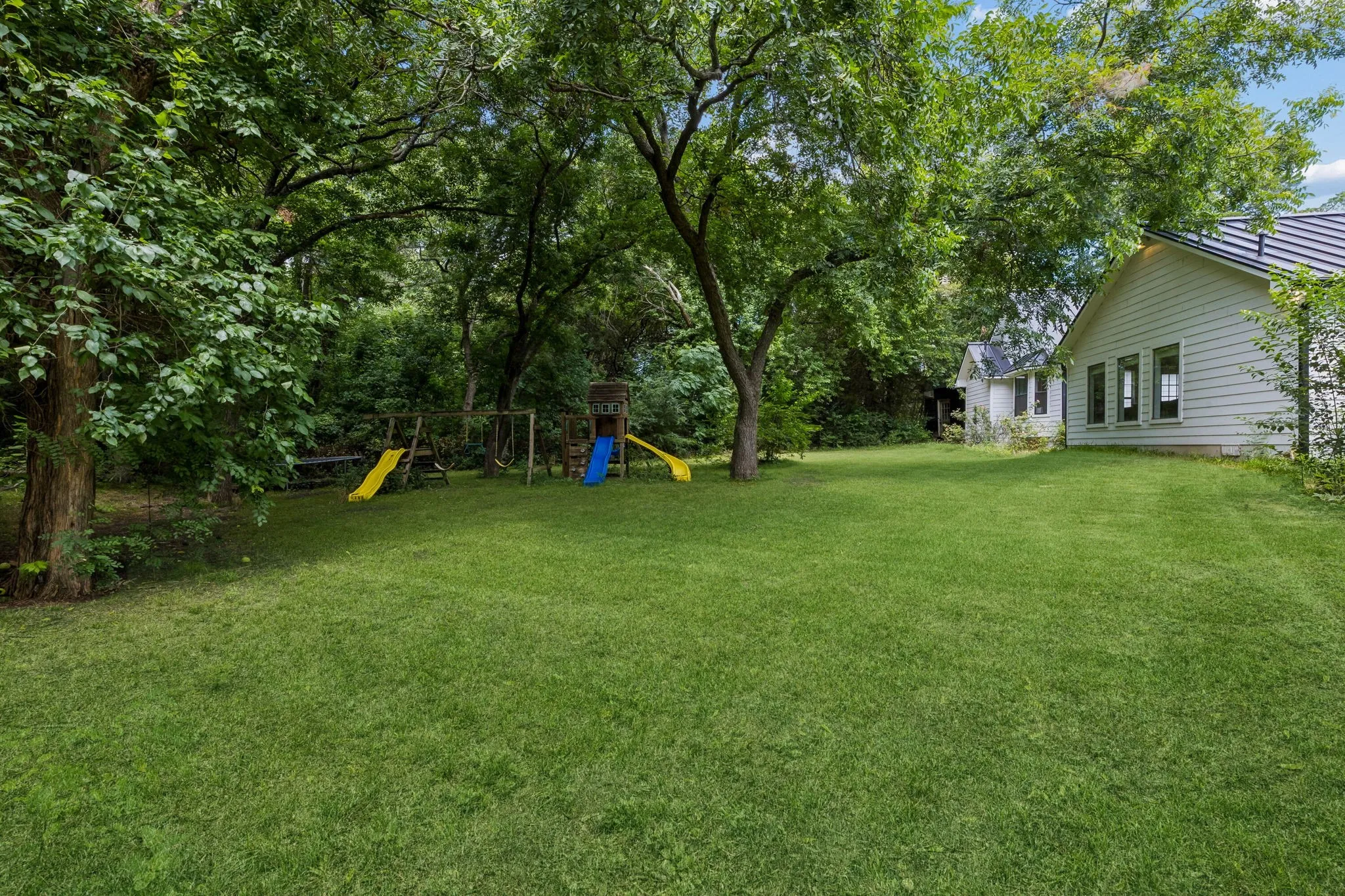 Watch the kids play under the pecan trees that produce abundant harvests every few years