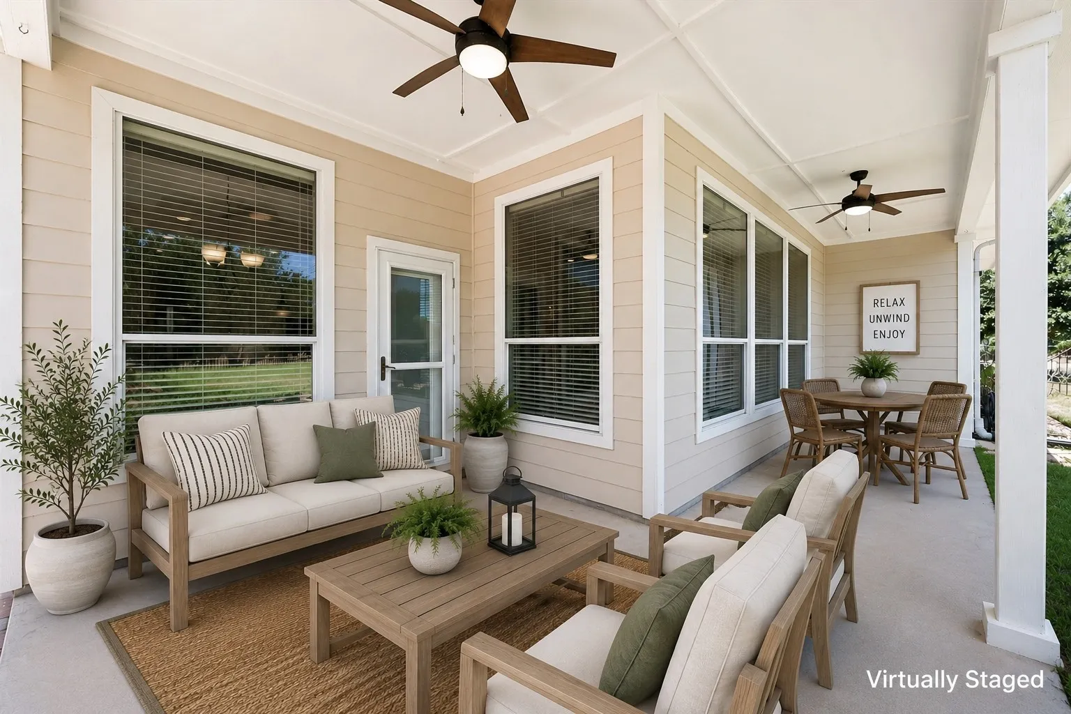 Virtually staged rear porch creates an inviting place to relax, dine, and enjoy the Sweetwater Ranch lifestyle.
