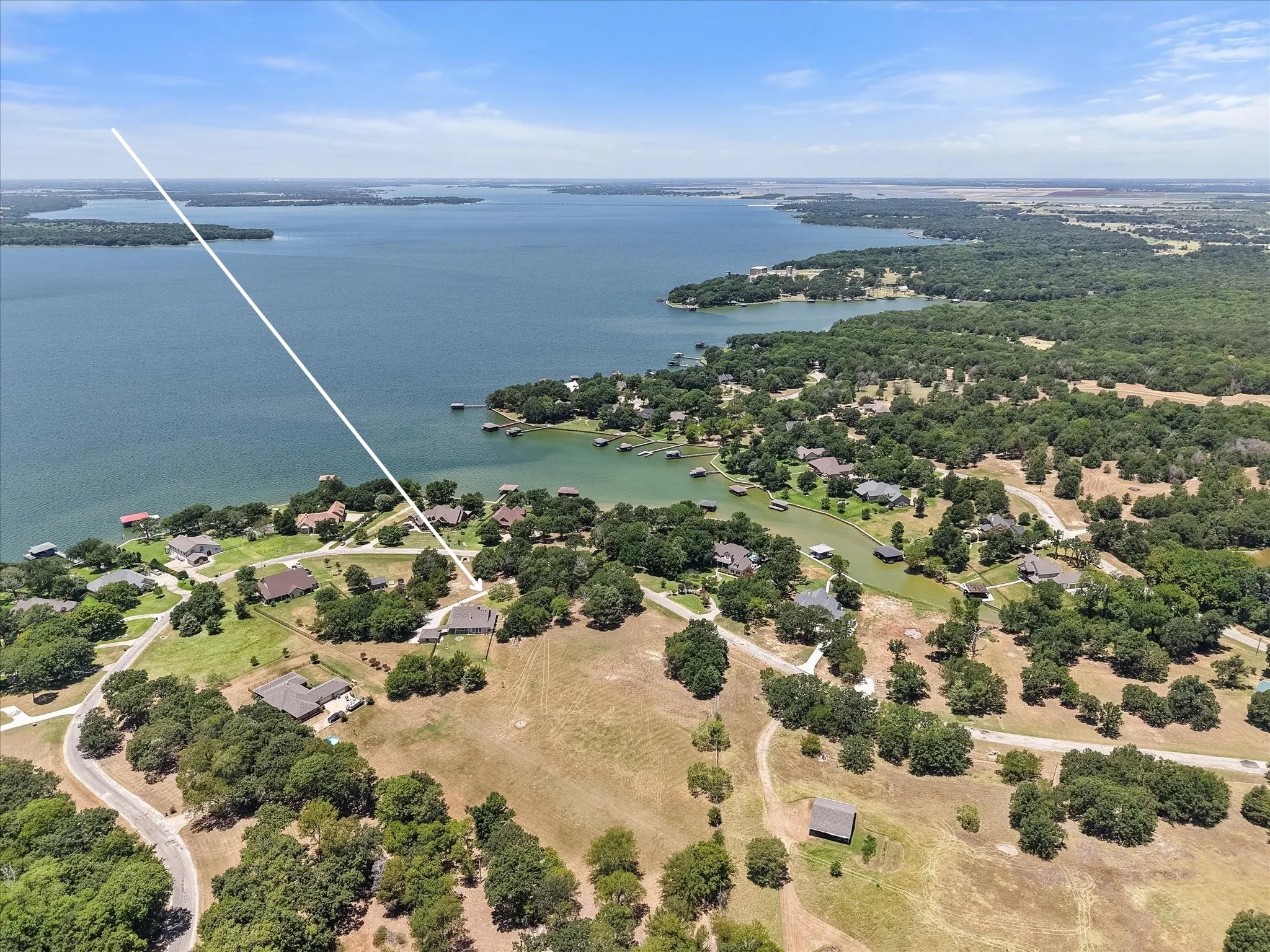 Aerial view places the home near Richland-Chambers Lake in the peaceful Sweetwater Ranch community.