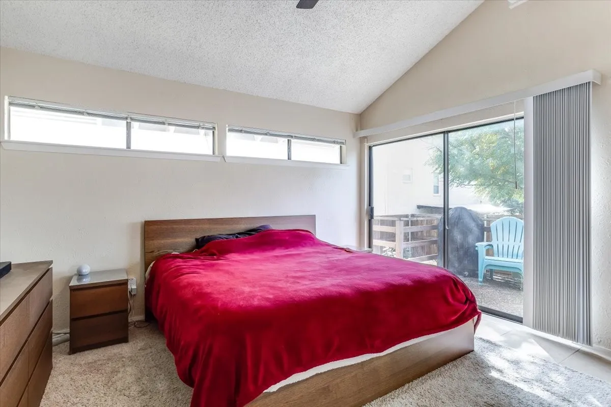 Spacious main bedroom with deck access
