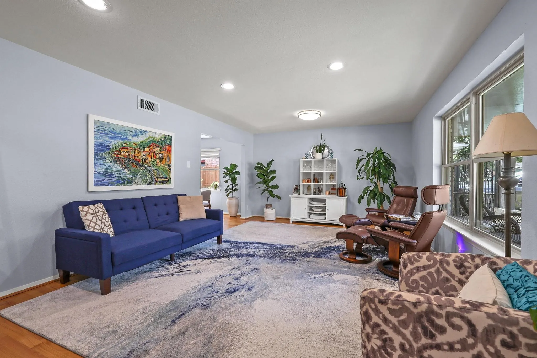 Versatility! Use this as one large living area, or create an dining and living room
