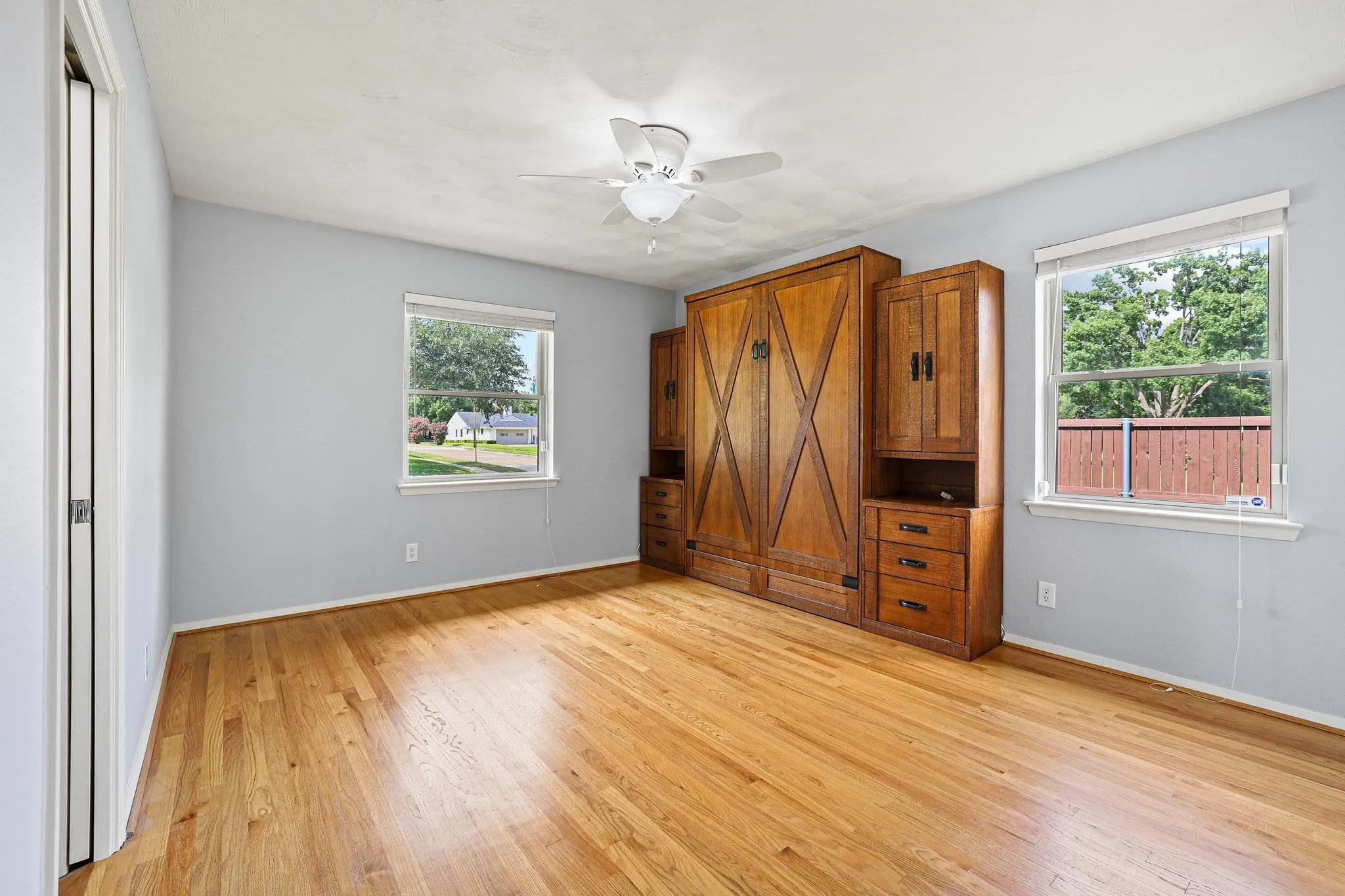 Bedroom 3. The custom Murphy bed conveys!