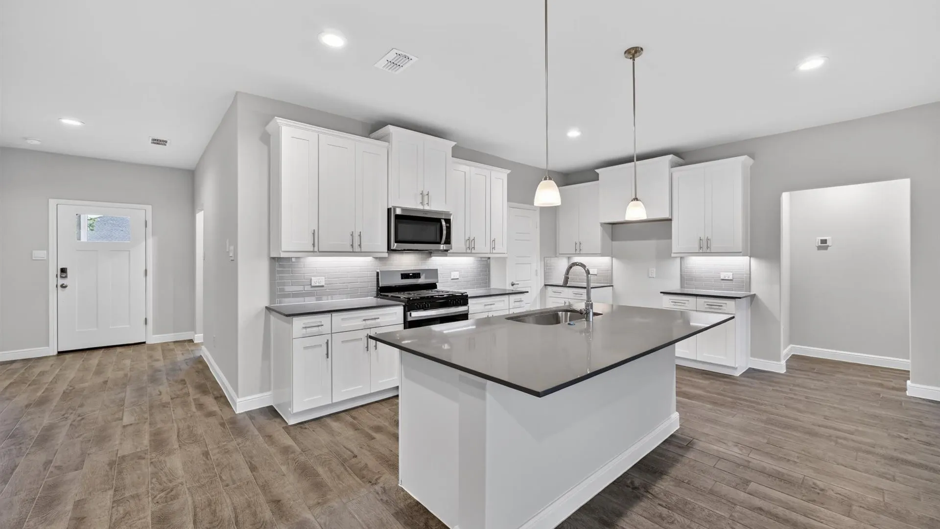 Kitchen - All Home and community information, including pricing, included features, terms, availability and amenities, are subject to change at any time without notice or obligation. All Drawings, pictures, photographs, video, square footages, floor plans, elevations, features, colors and sizes are approximate for illustration purposes only and will vary from the homes as built.
