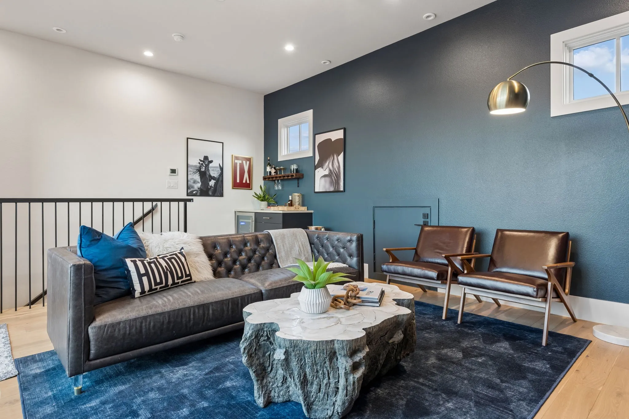 Top Level Lounge. Adjoins the upper balcony with 4 panel sliders..Whiskey & Cigars on the patio or movie night inside. Texas sized built in grill on this level.