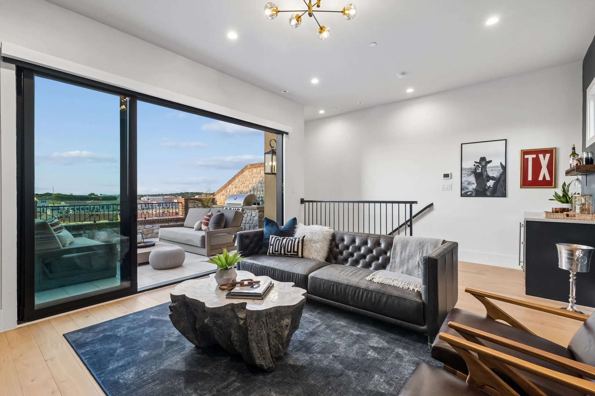 4th level with built in wine refrigerator opens to roof top patio
Also includes motorized shade.perfect for watching movies