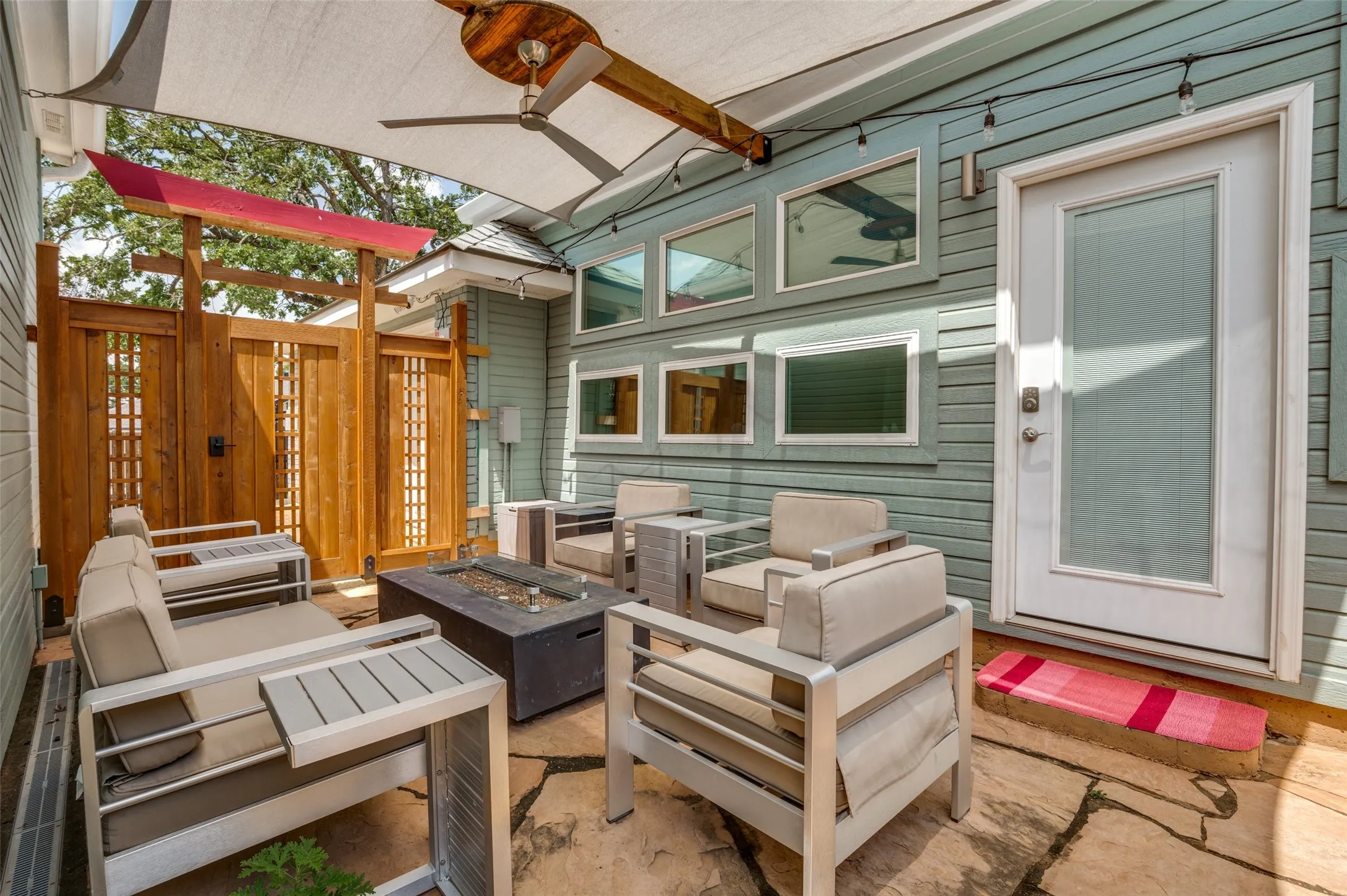 Shaded Patio w/ ceiling fan and secured gate