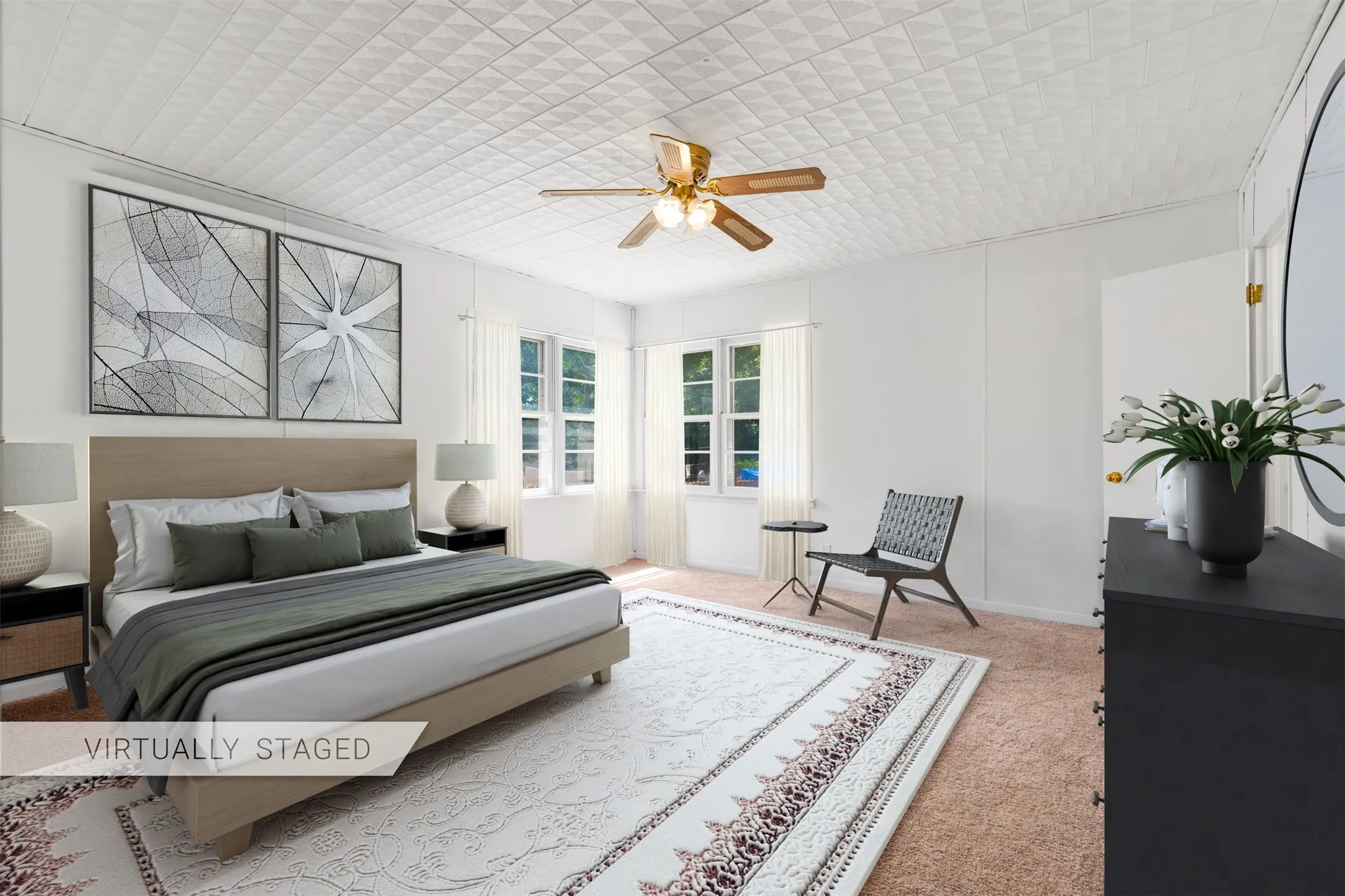 Room featuring a textured ceiling, multiple window openings, and wall-mounted ceiling fan