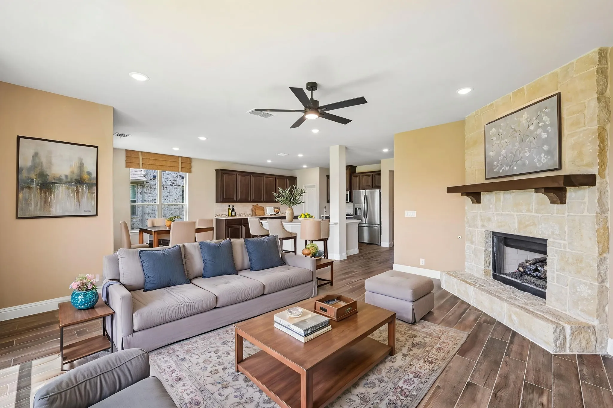 Open concept kitchen and living room - digitally staged