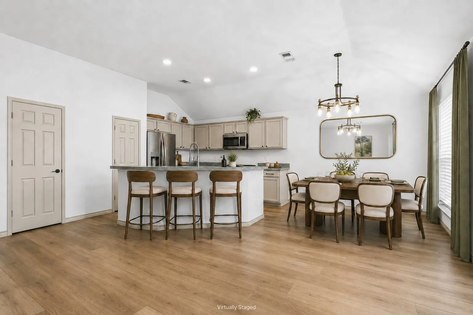 The laundry room and garage are just off the kitchen area