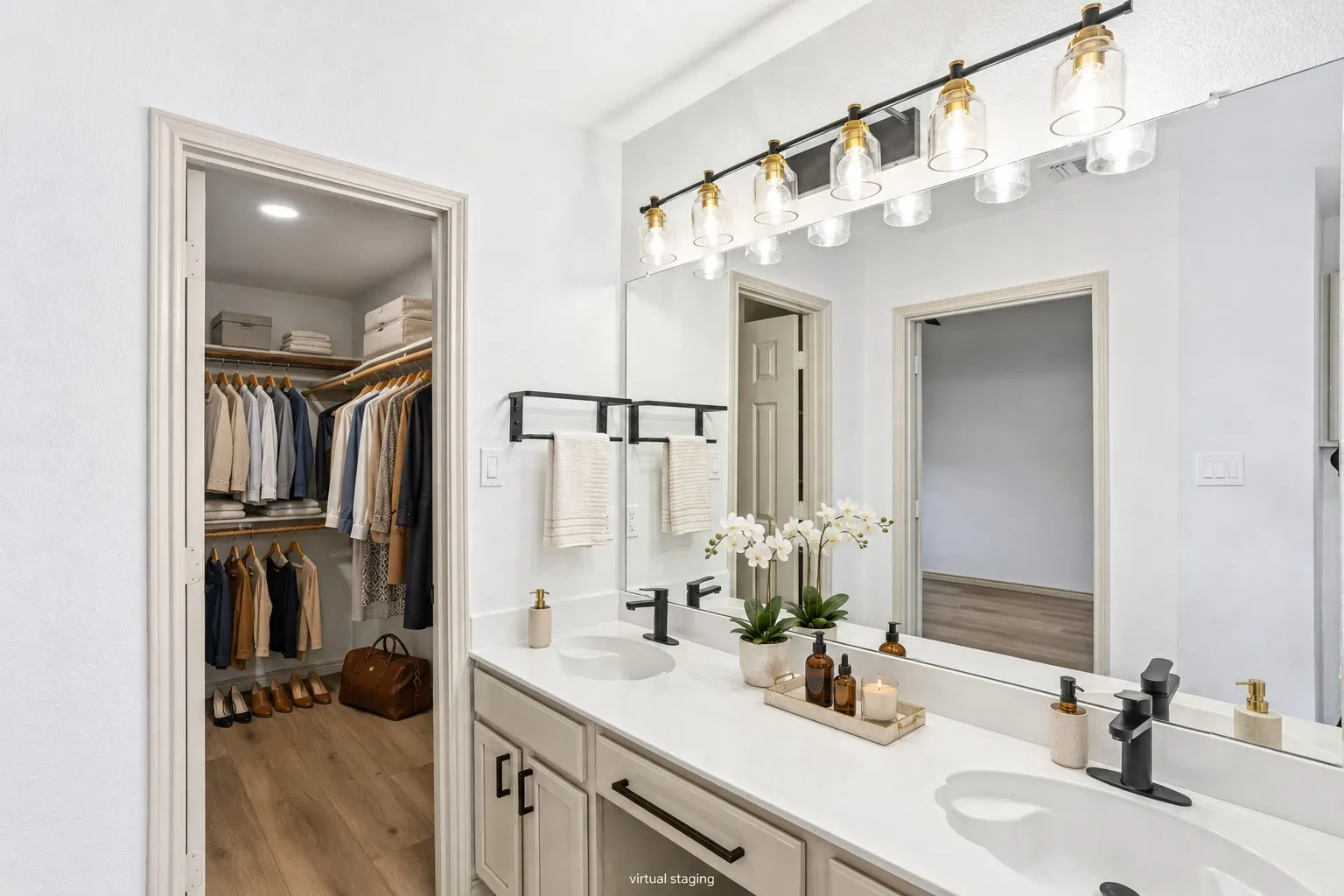 Everyone loves the double sinks! And what about this great closet?! Large walk-in closet for the primary suite.