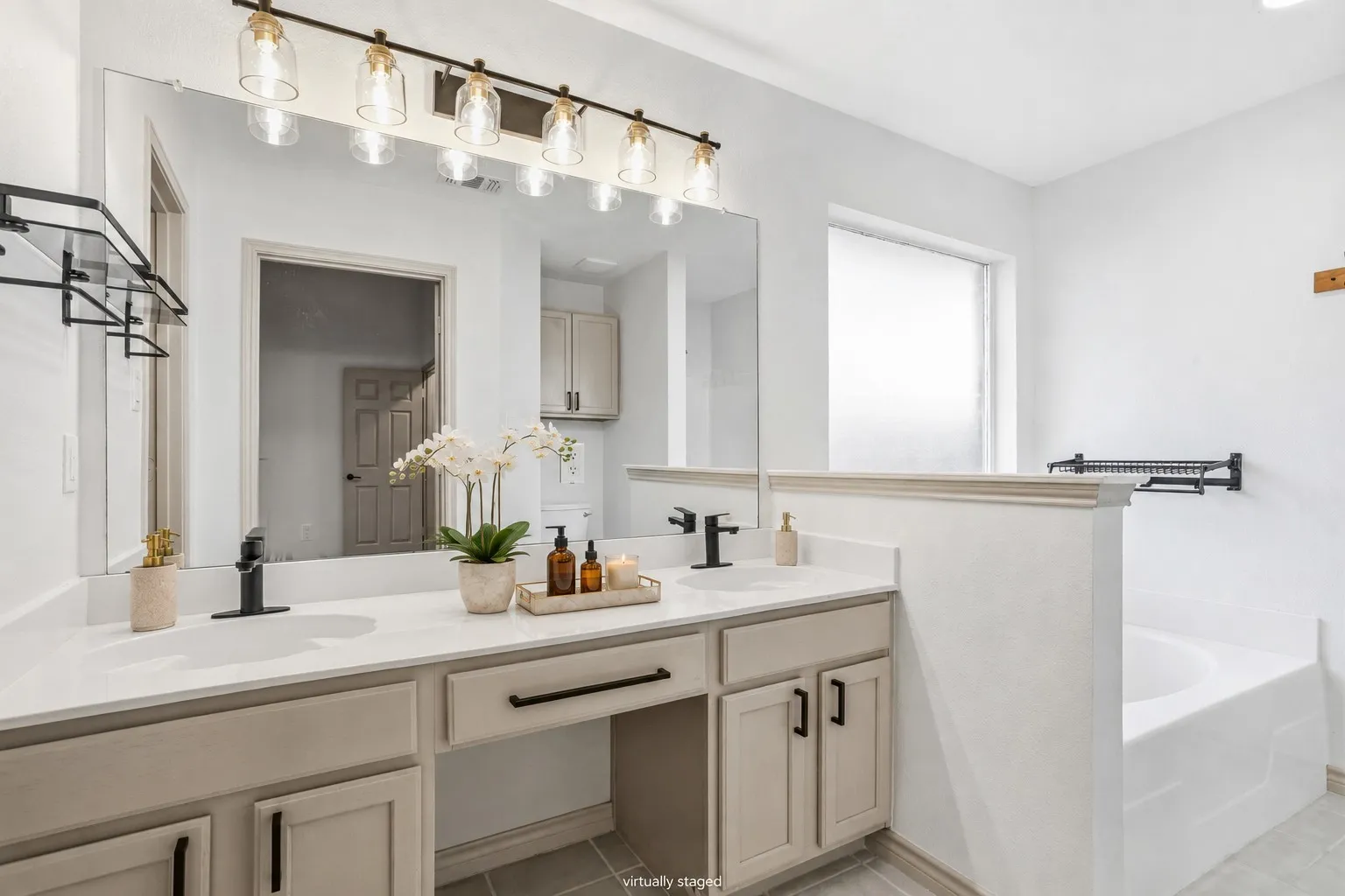 A lovely and coveted primary bathroom