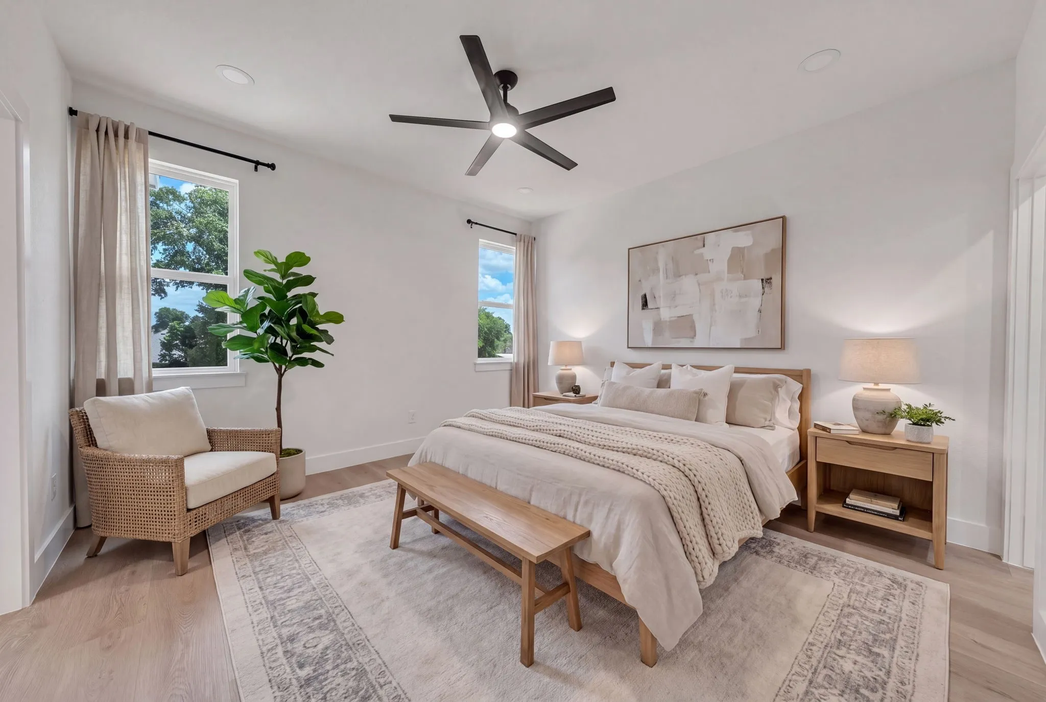 Bedroom featuring a contemporary ceiling fan, recessed lighting, and wood-finish flooring