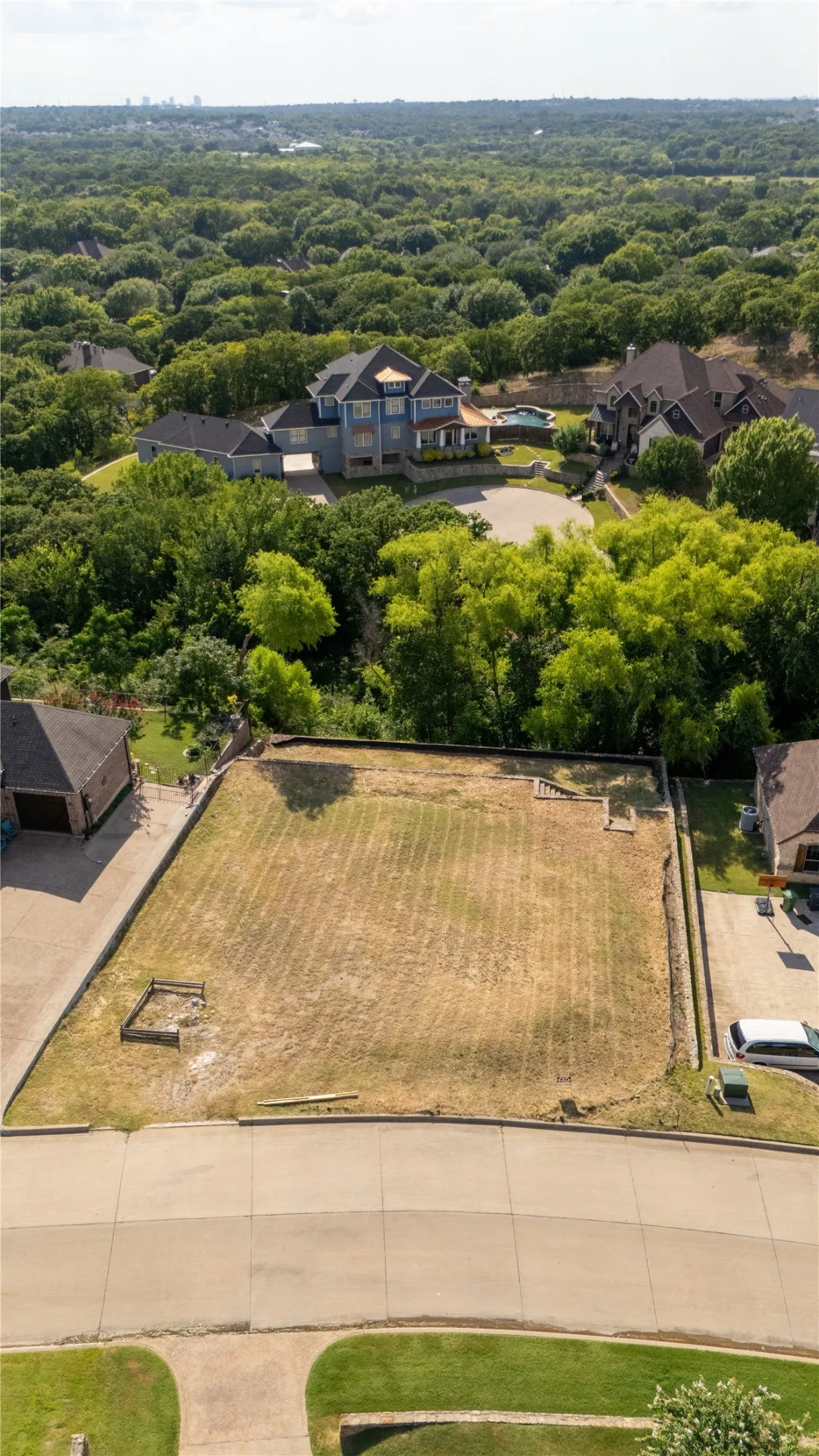 Generous lot with a flat, cleared building area