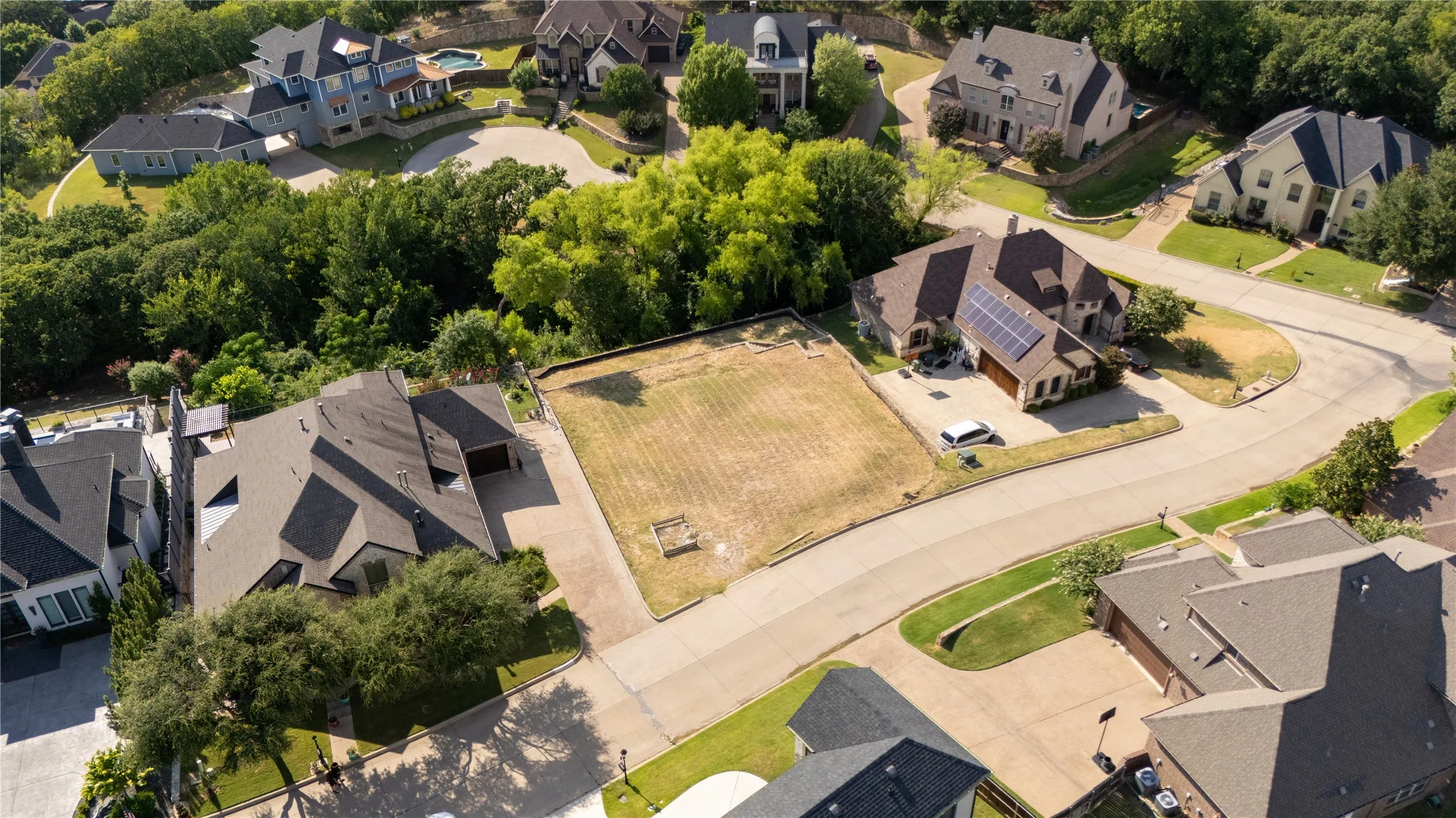 Expansive undeveloped lot featuring a level grade and direct street access