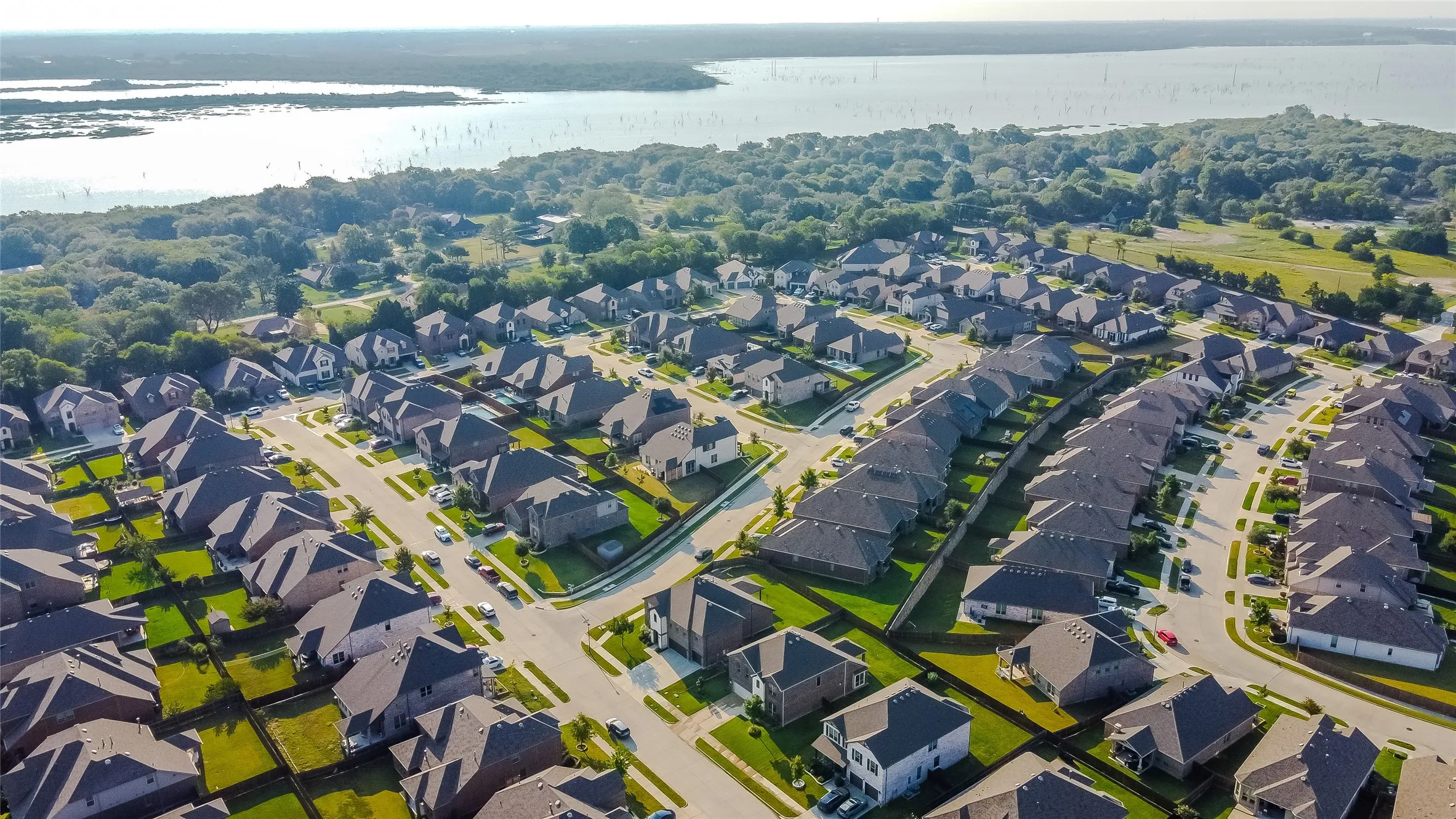 View of property location with a nearby body of water