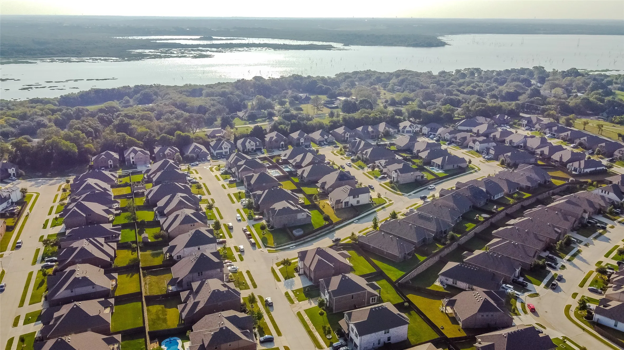 Aerial overview of property's location featuring a nearby body of water