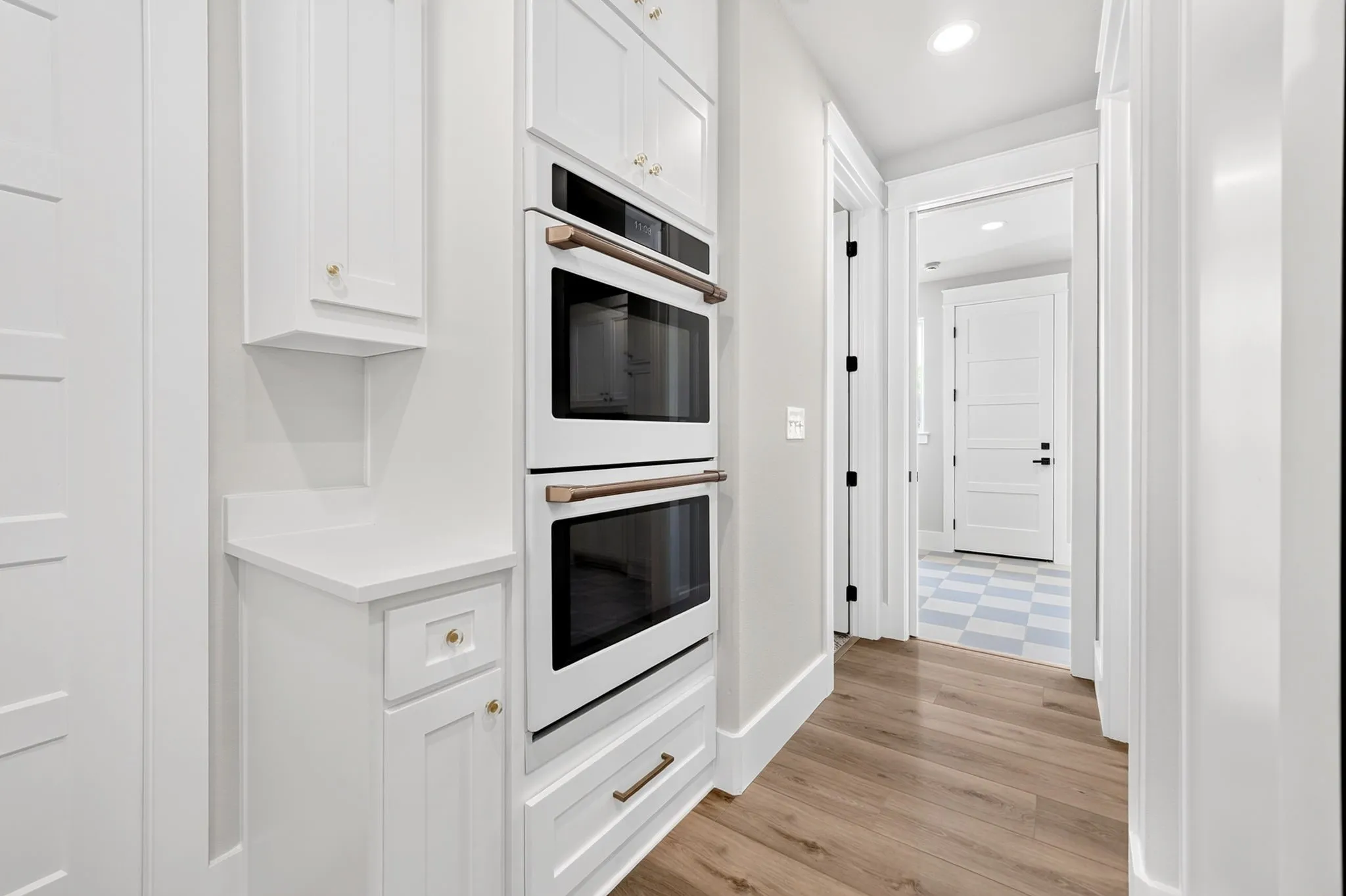 Gourmet kitchen includes a premium built-in Cafe double oven.