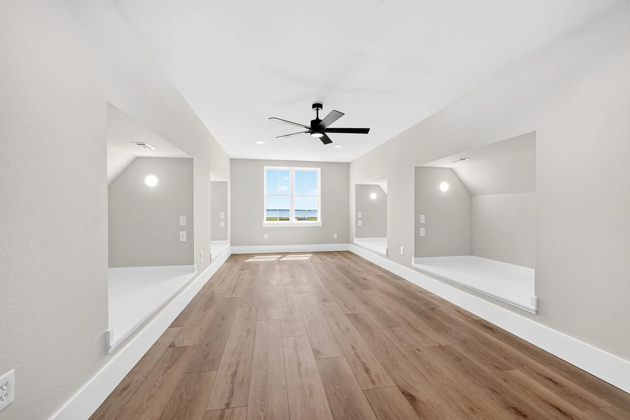 Ultimate destination for large families: Custom-built-in bunk room equipped with four distinct beds.  Each nook features a private sconce light and dedicated electrical outlets.