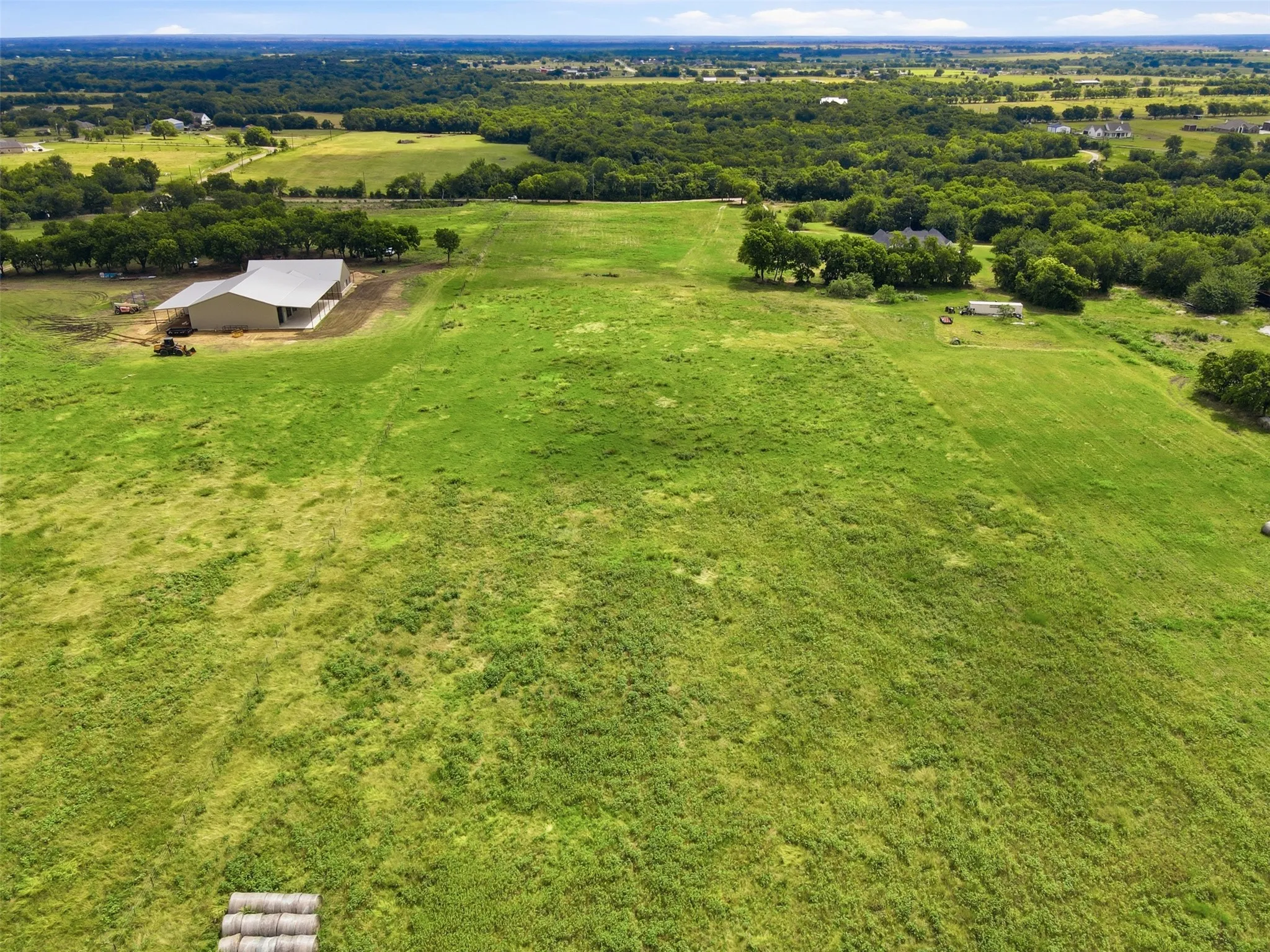 Land from midway back. Dividing fence can be seen to the left.