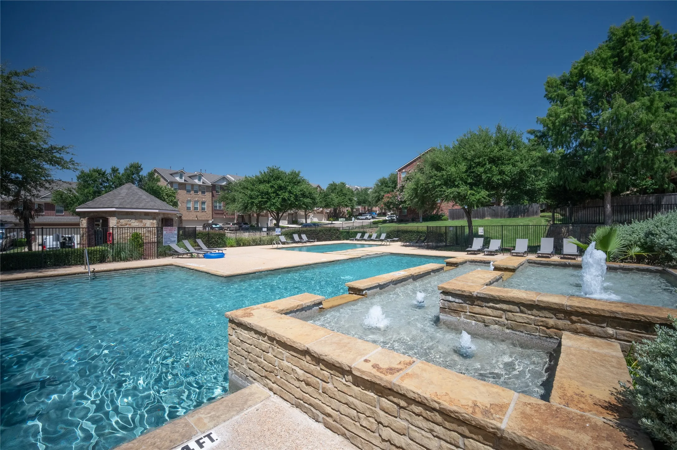 Community kids pool with fountains.