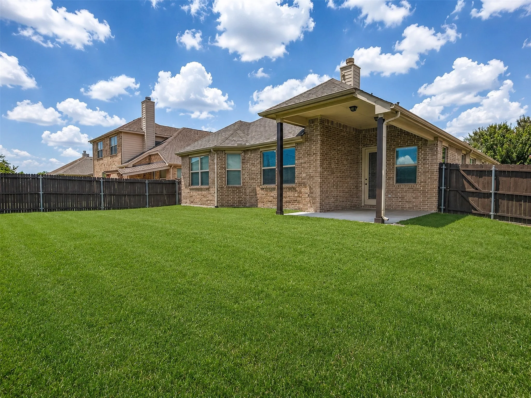 Covered Patio & Spacious Backyard