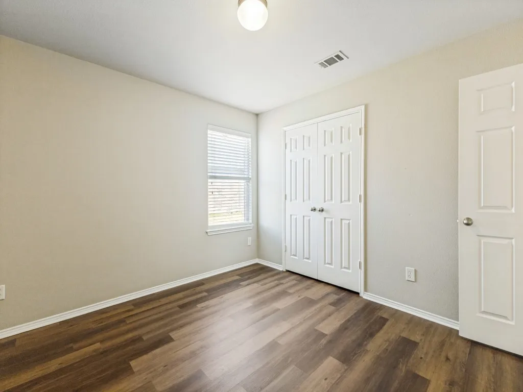 Wood-finish flooring throughout