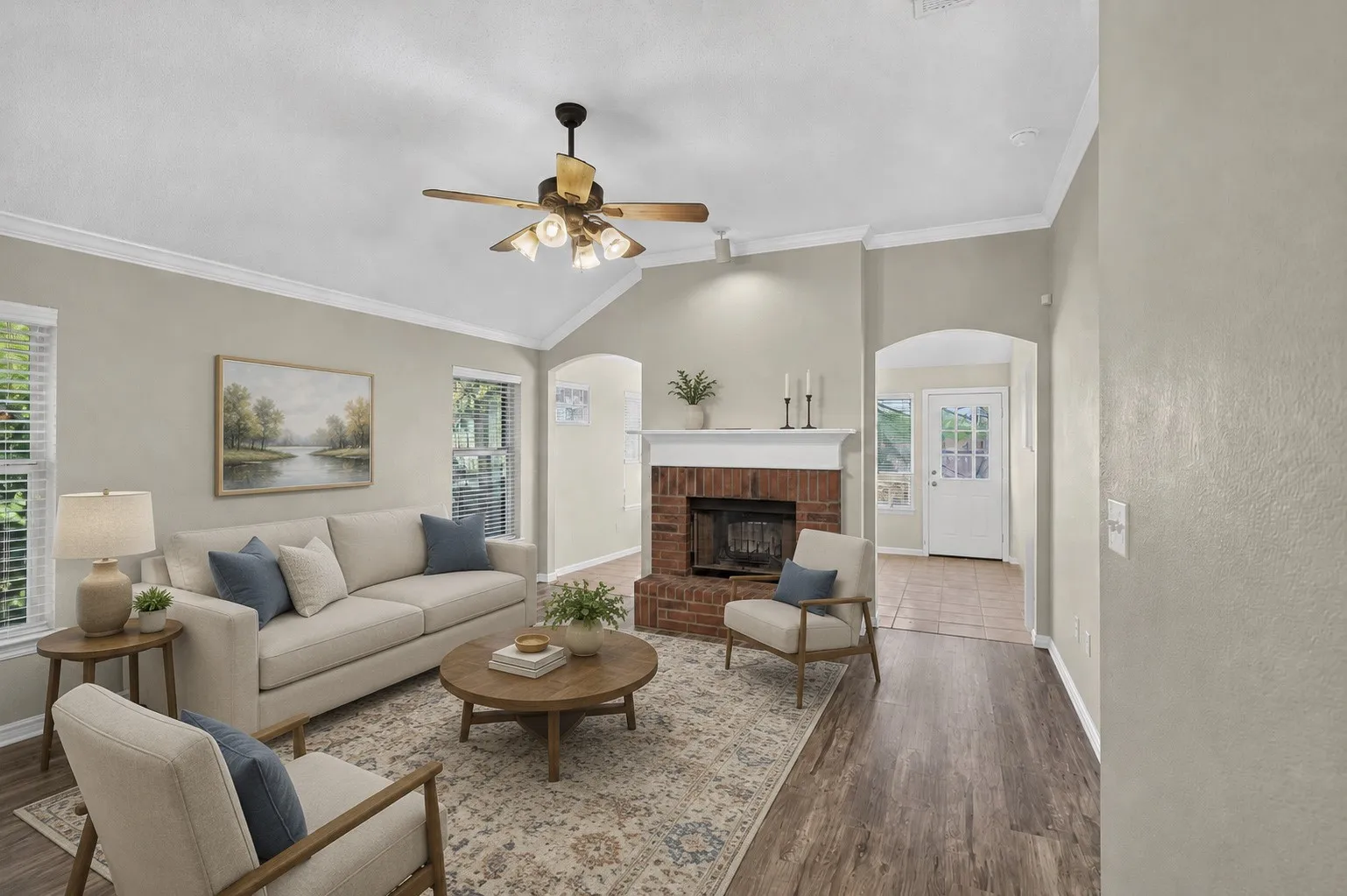 Living room with a shared fireplace.