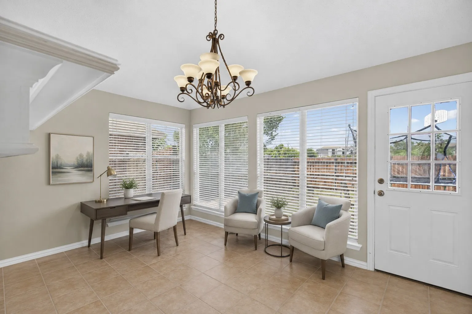 Back family room that shares the fireplace.