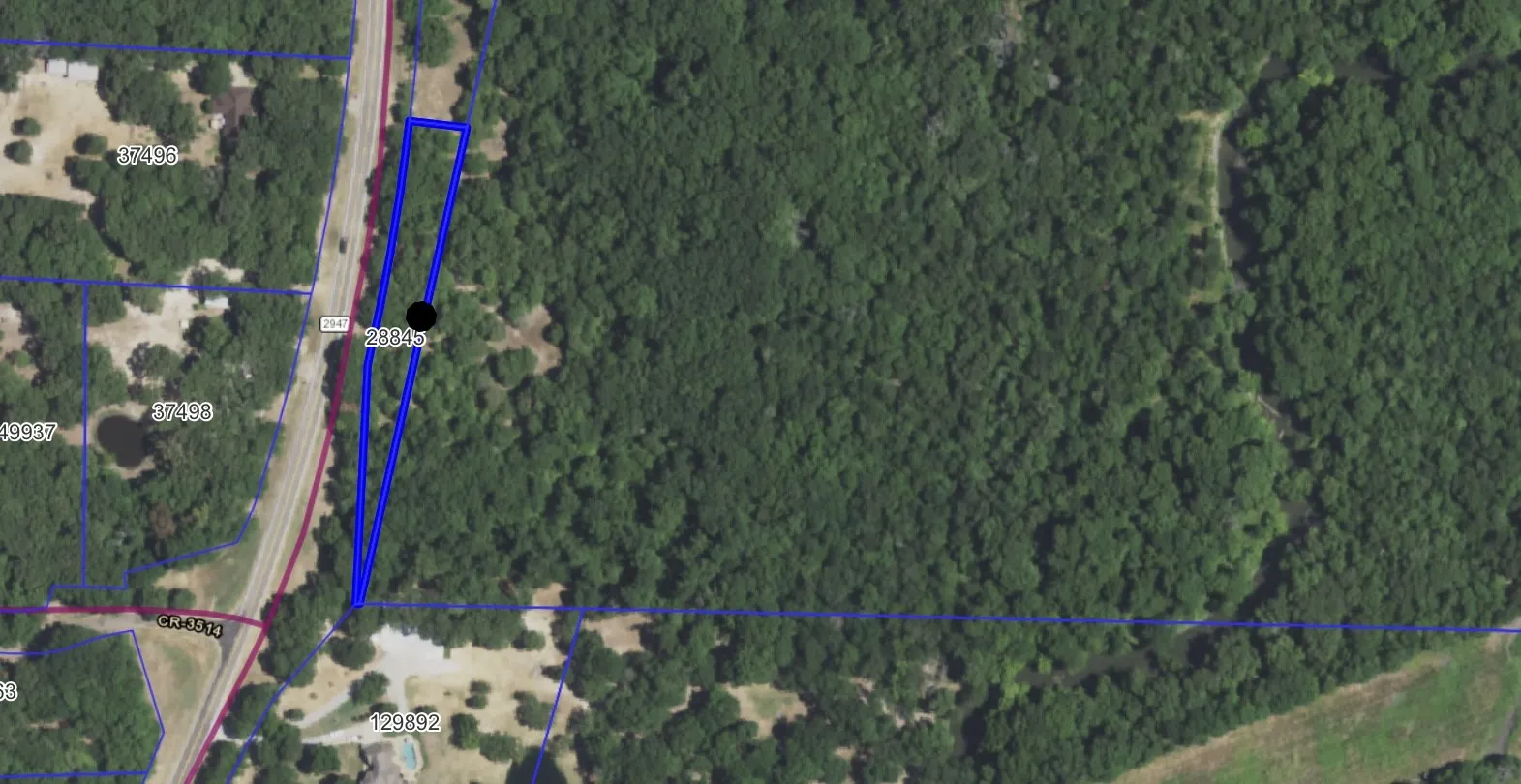 Aerial Map. Displaying the property's boundaries and surrounding land features