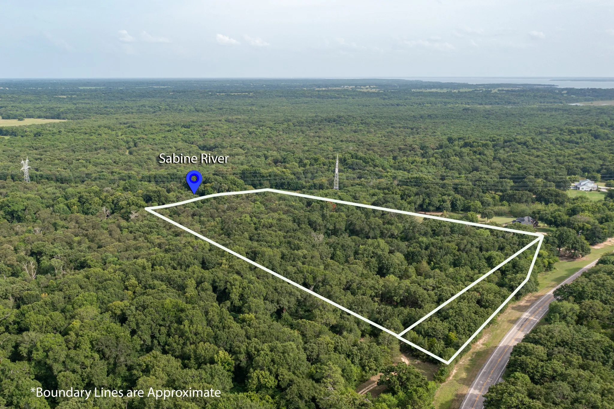 Aerial depiction of a substantial wooded land parcel
