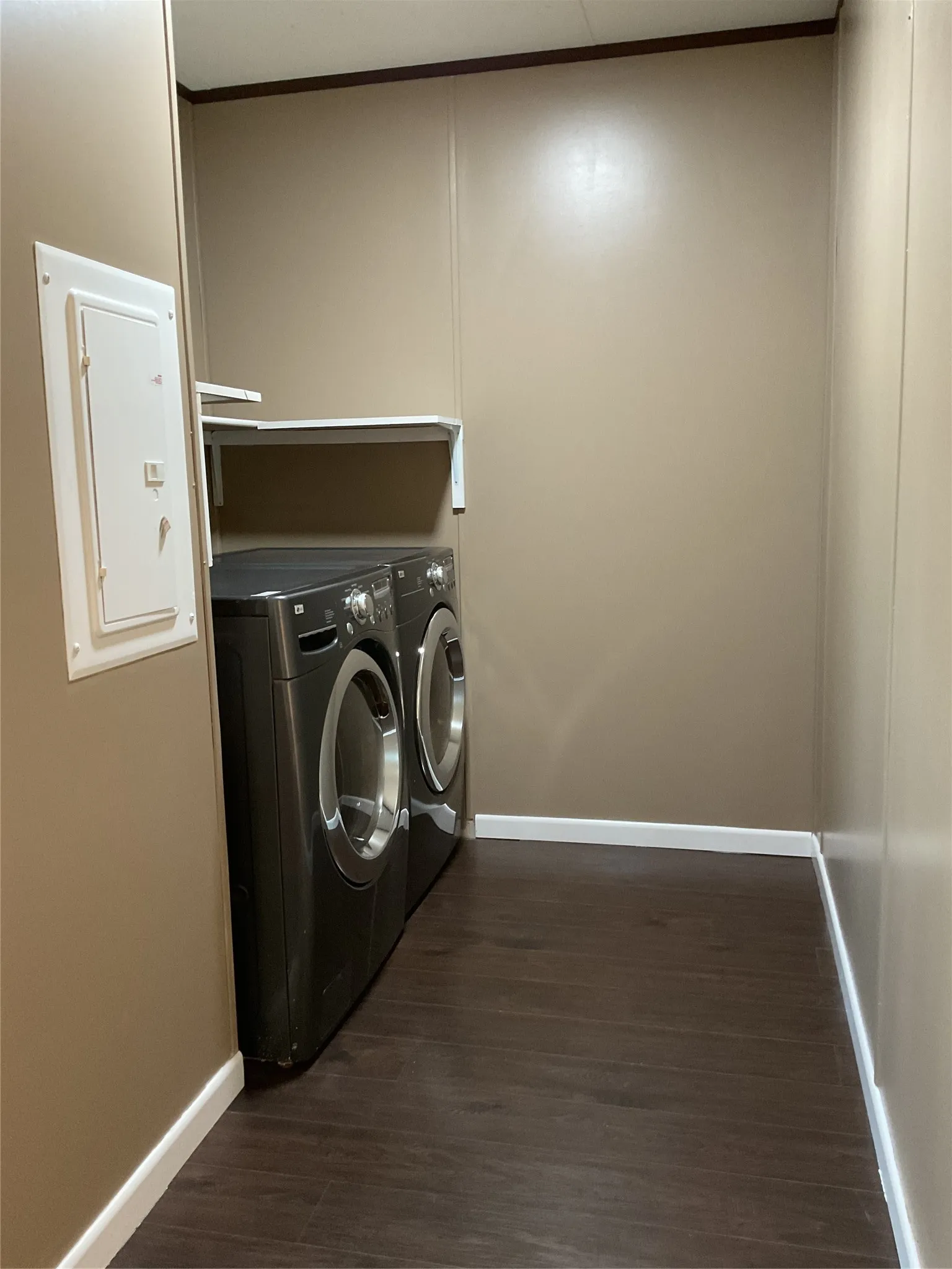 Full size washer and dryer area.