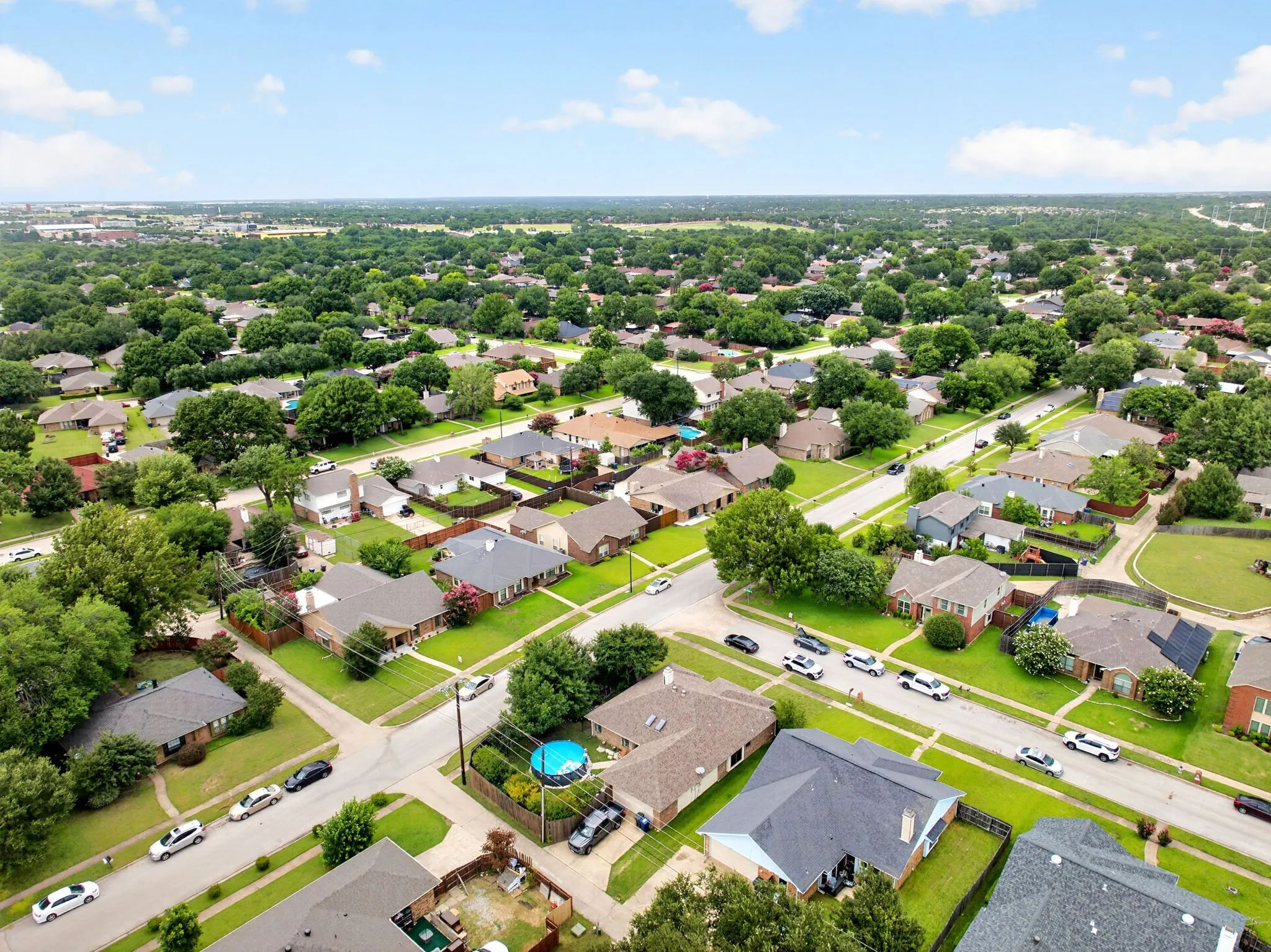 Aerial view no. 2 of back alley. Note to buyer, pool has been removed.