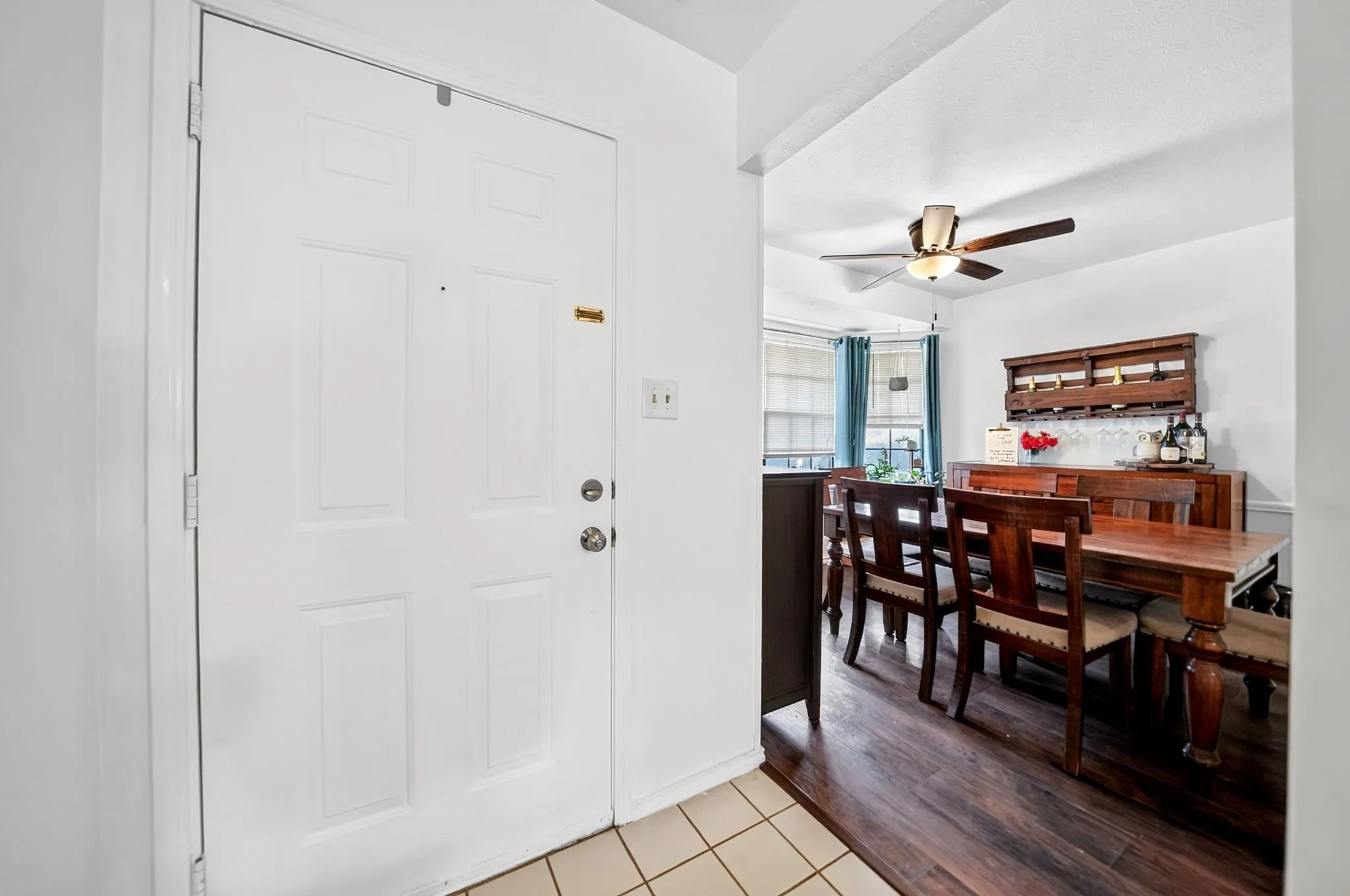 Entrance Foyer: Fresh paint makes the front door area bright and clean.