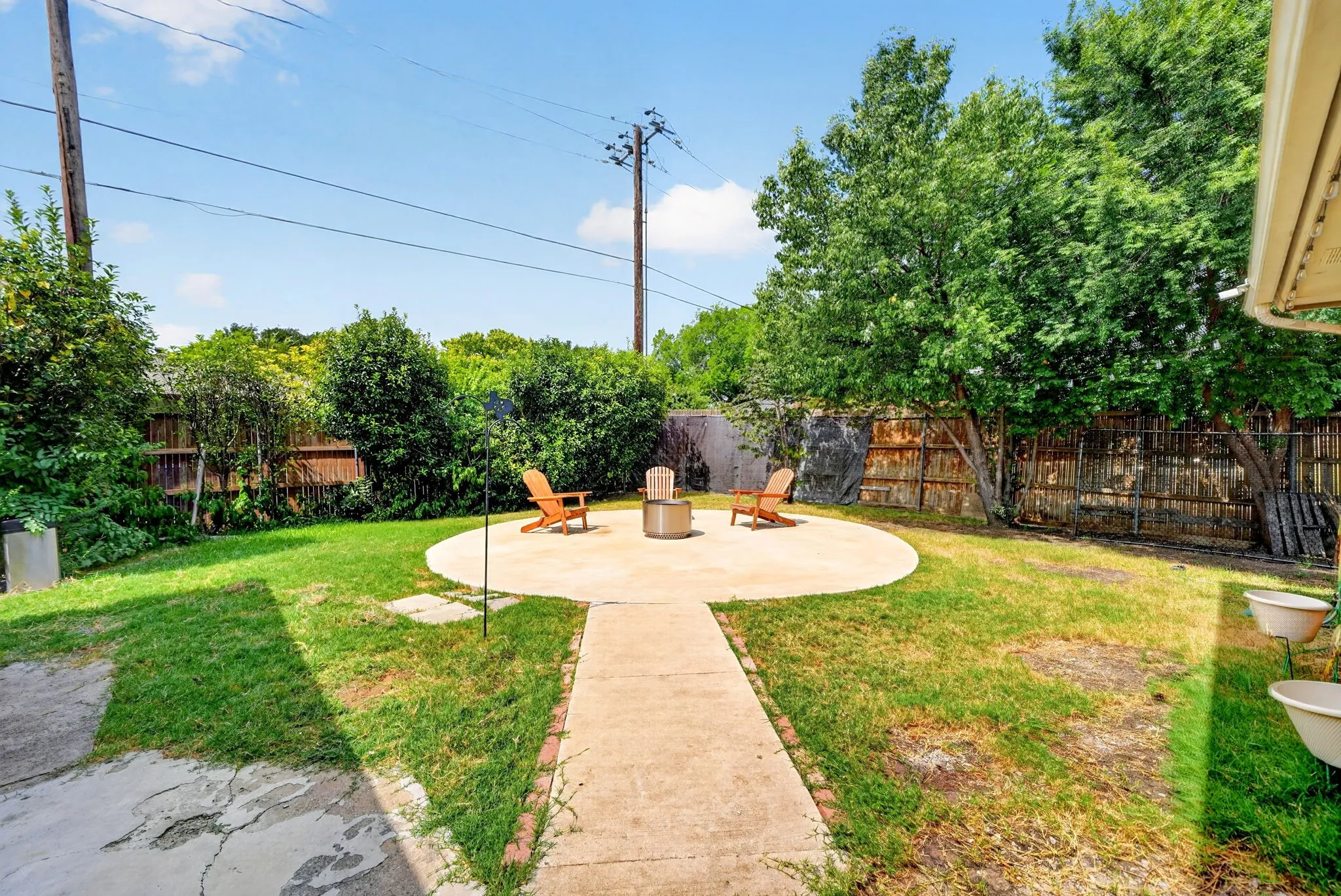 The view of the wide backyard from the patio.