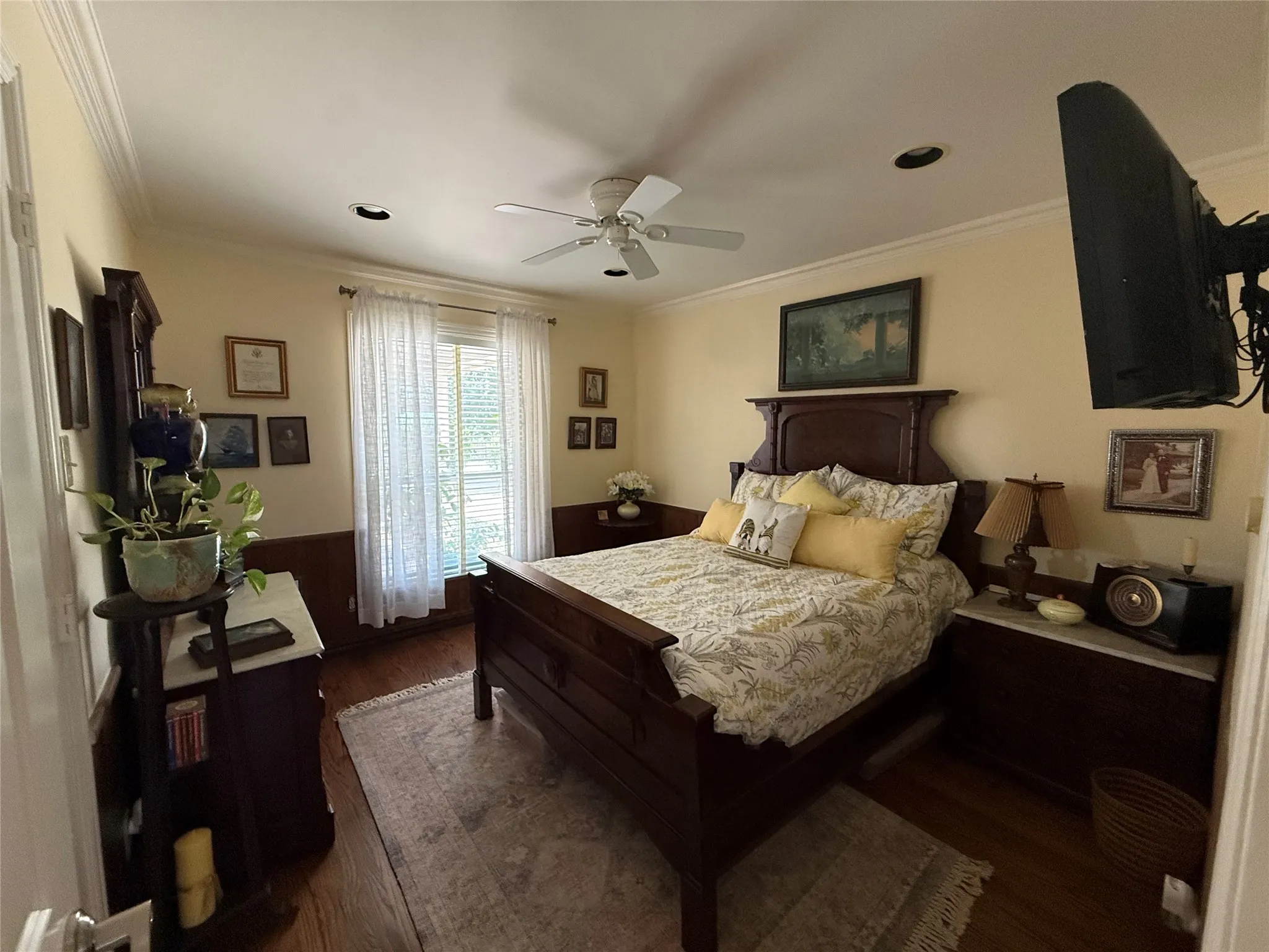 Hardwood flooring complements a decorative wood wainscoting