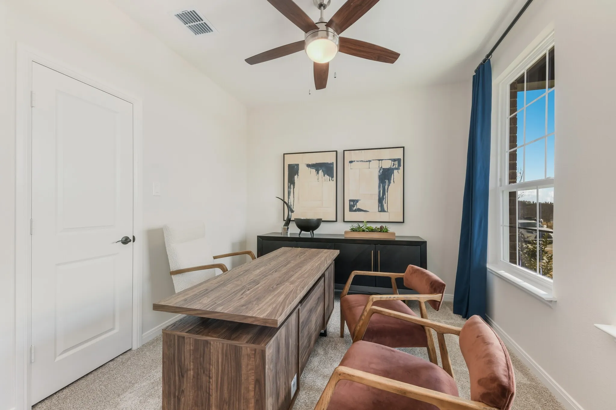 The professional needing to work from home will appreciate this private, light filled home office.