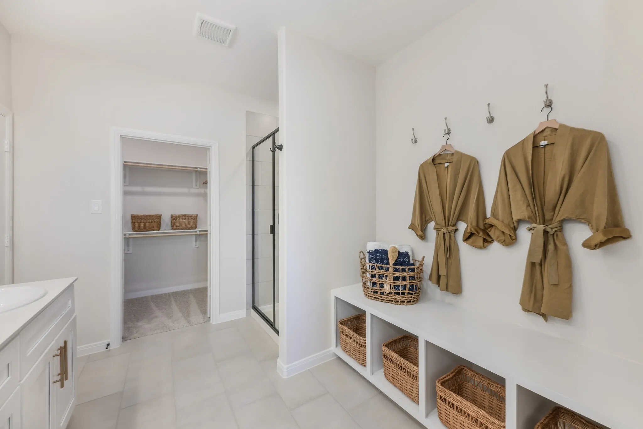 This wonderful owner's bath offers a spacious walk in shower and plenty of space for pampering!
