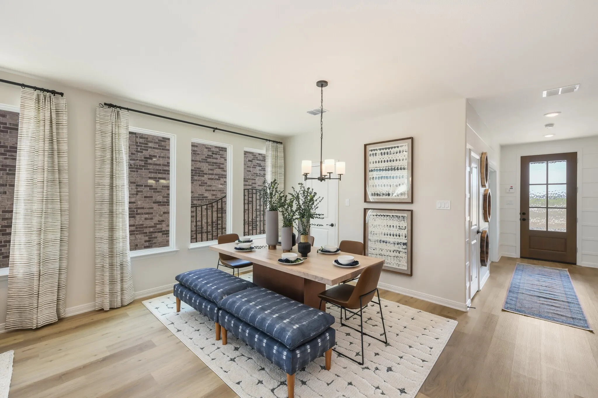 Adjacent to the kitchen, this lovely dining area is the perfect place for cozy family meals or fun dinner parties!
