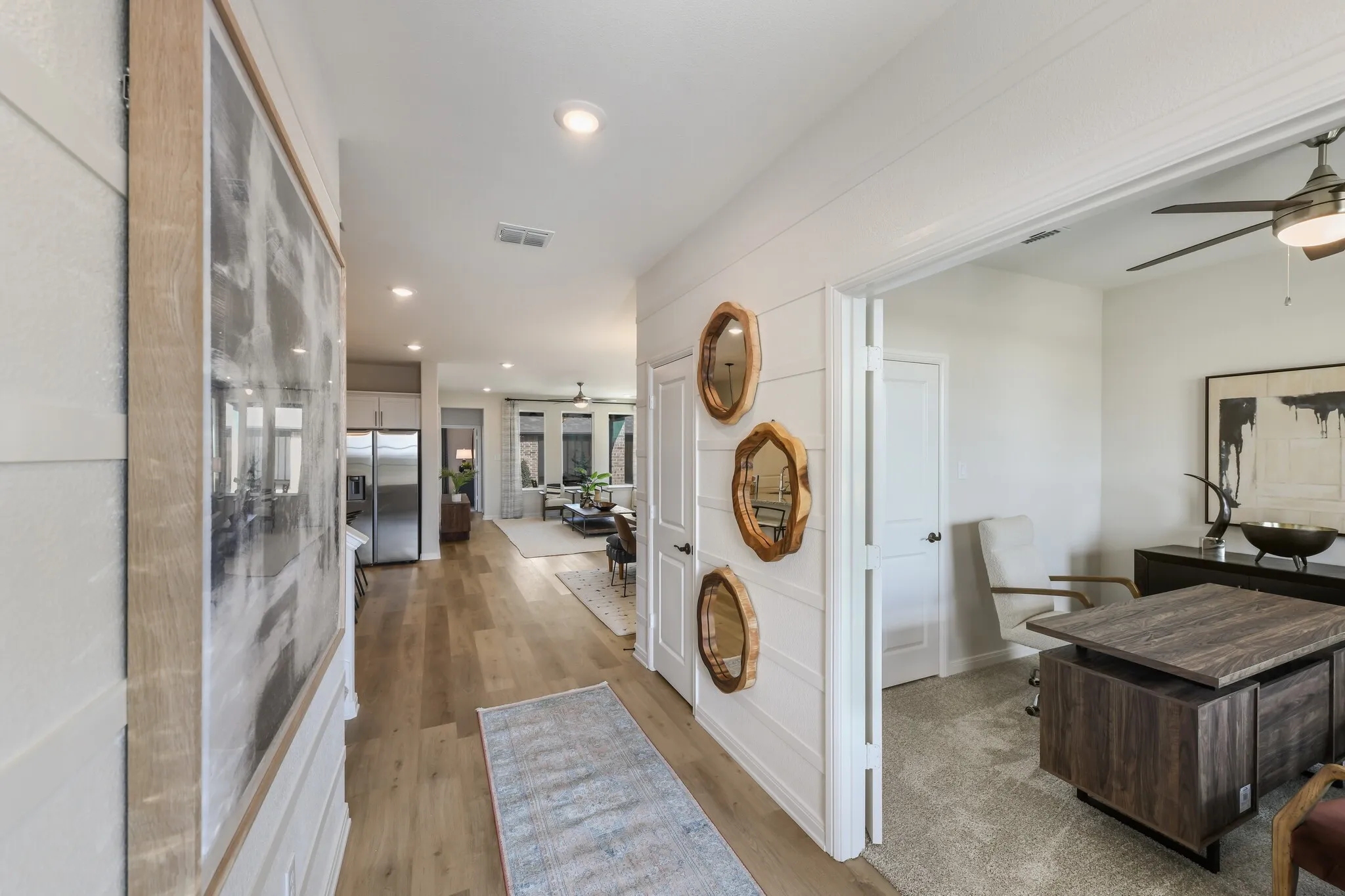 With a stunning entry featuring sight lines through to the rear of the home and ample wall space to display art work, you will love inviting friends and family into this beautiful home!