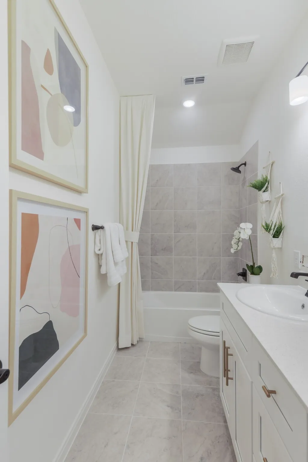Friends and family will feel right at home in either of the beautifully finished guest baths.